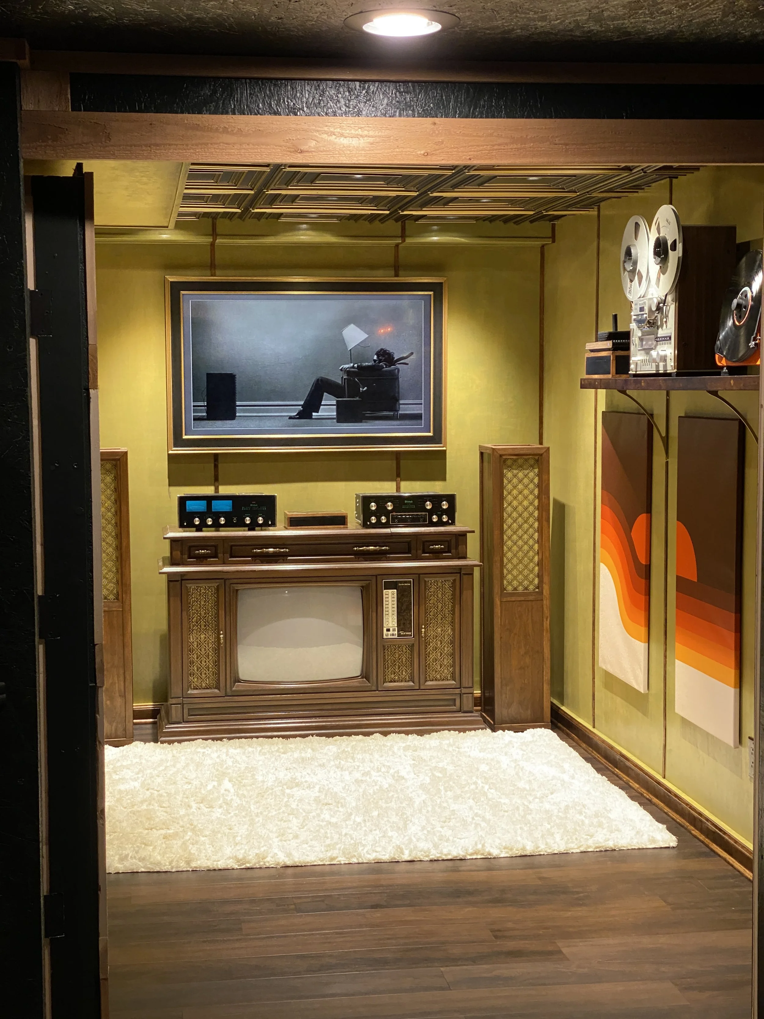 Added a groovy shag rug and some 70's style art.