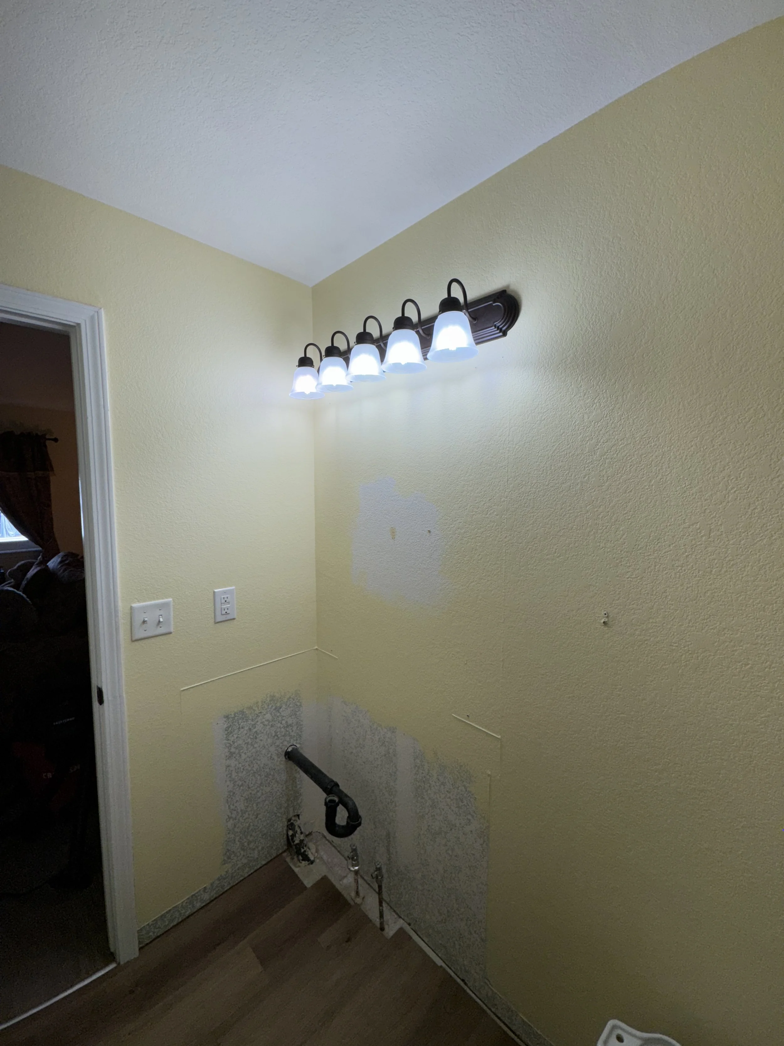 New lighting (chosen by the homeowner) is in.