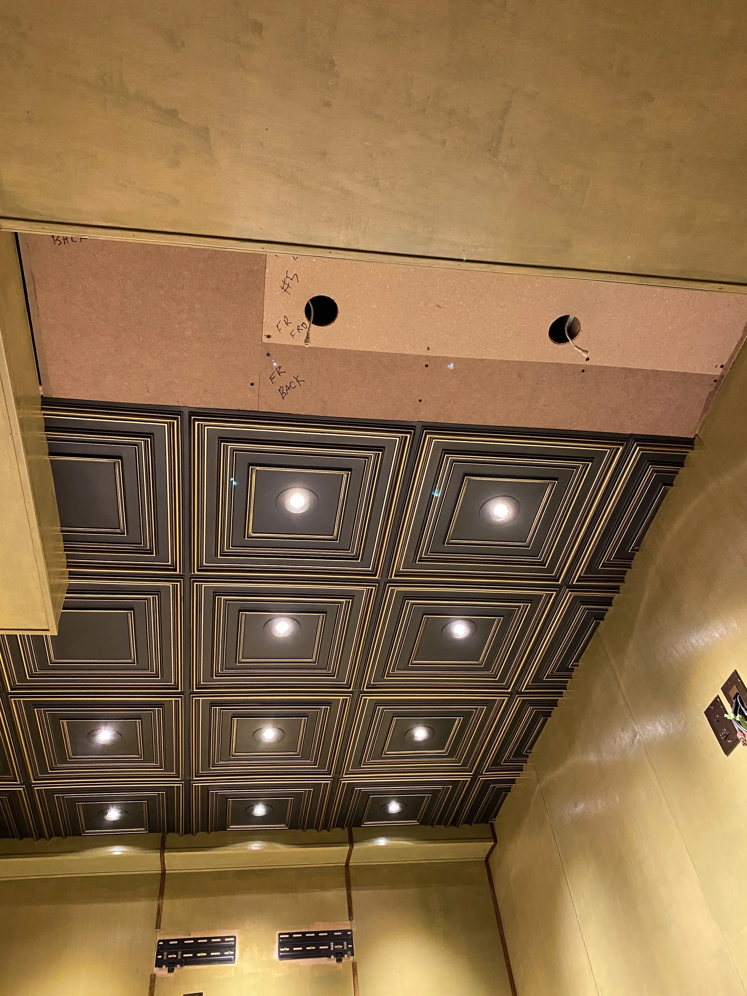 Ceiling panels almost done... super easy, and they look fantastic!  