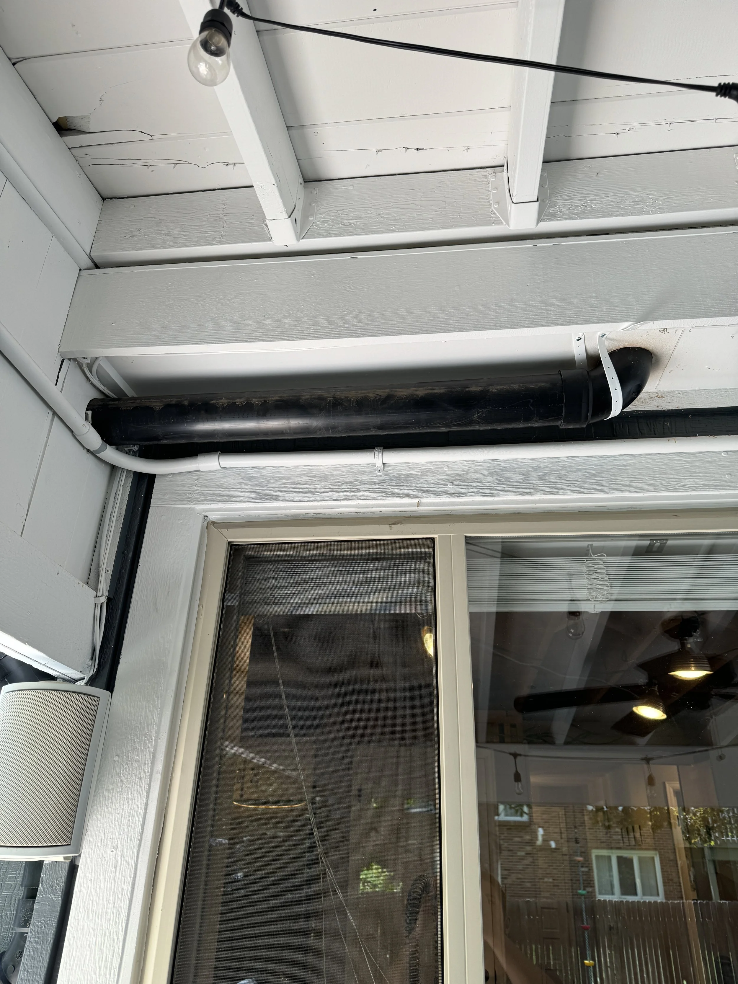 There we go. Colorado code allows for exterior drain lines, provided that they are wrapped in insulation and protected. So, next I will insulate the pipes, box them in, insulate the box, cover the box with plywood, and eventually paint the box to mat