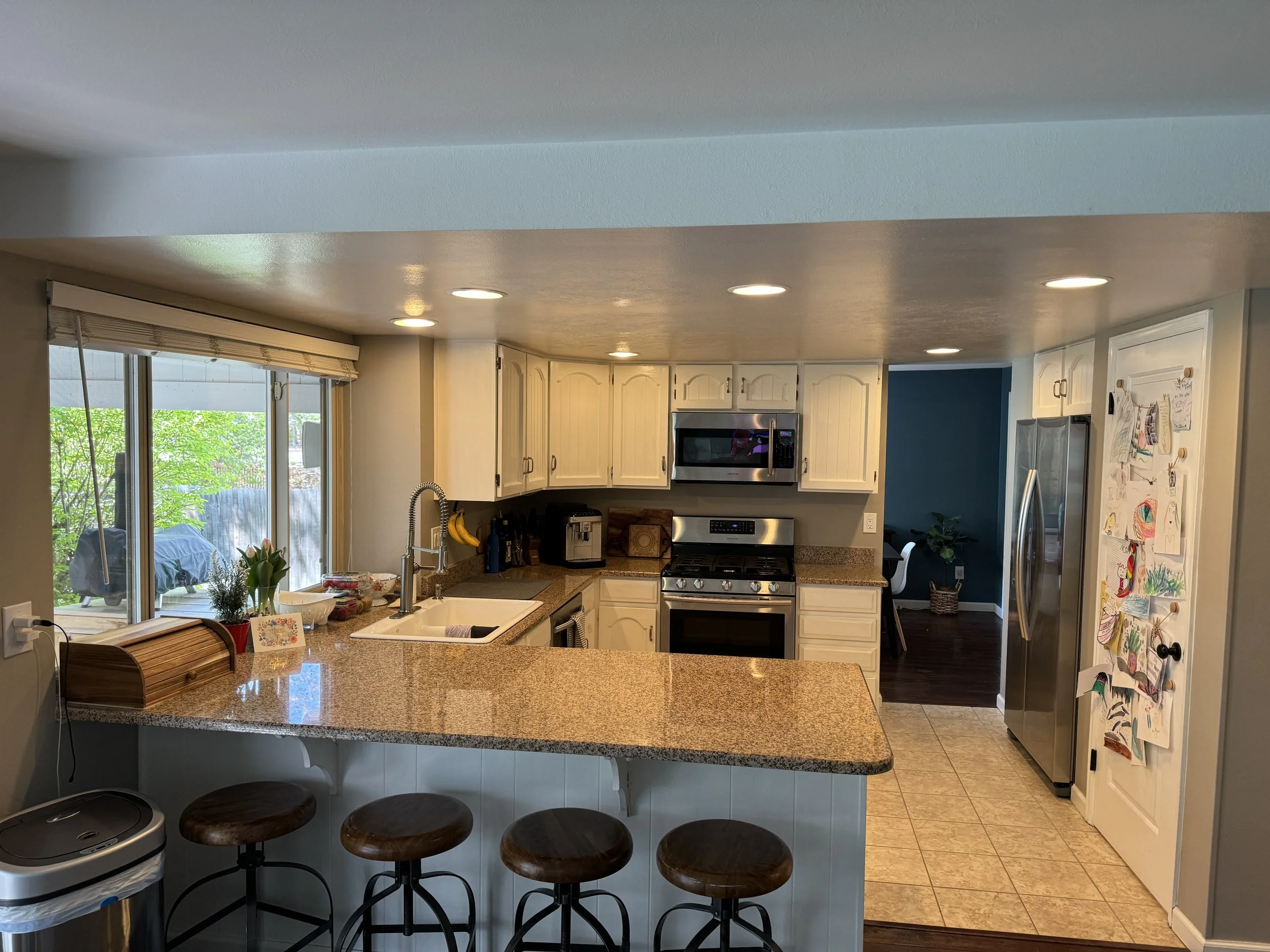 This is the before... which was the beginning of May.  Lots of cosmetic work to be done here, and vast improvements in storage, but I have always liked the layout.  :)