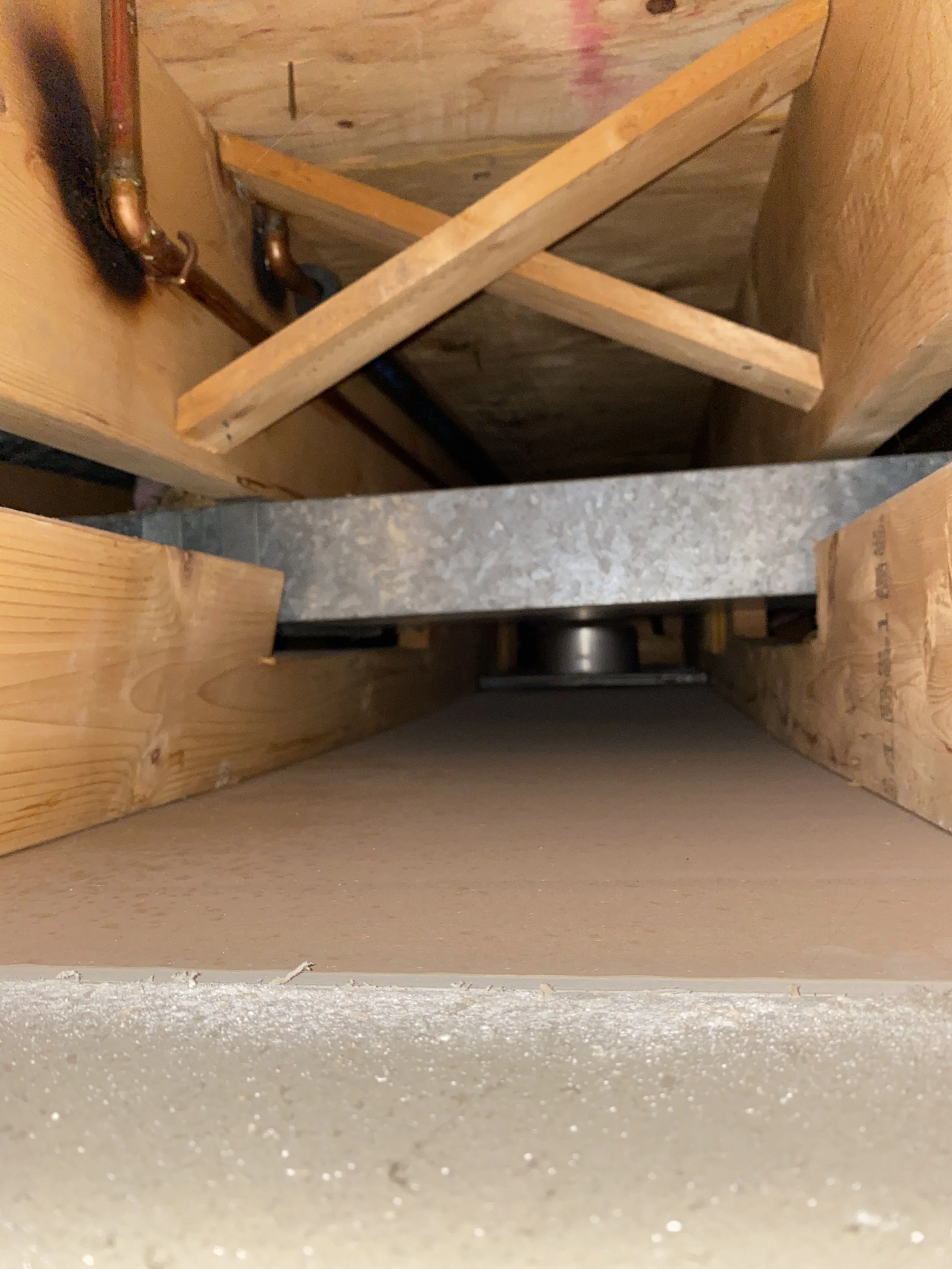 Ah ha!  There it is.  ONE SINGLE duct line.  Which... the placement makes sense if it can't be re-routed.  But, that's a TON of wasted space in ceiling height for one duct line.  I mean, I'll just wrap it to look like a beam, if it means 7 more inche