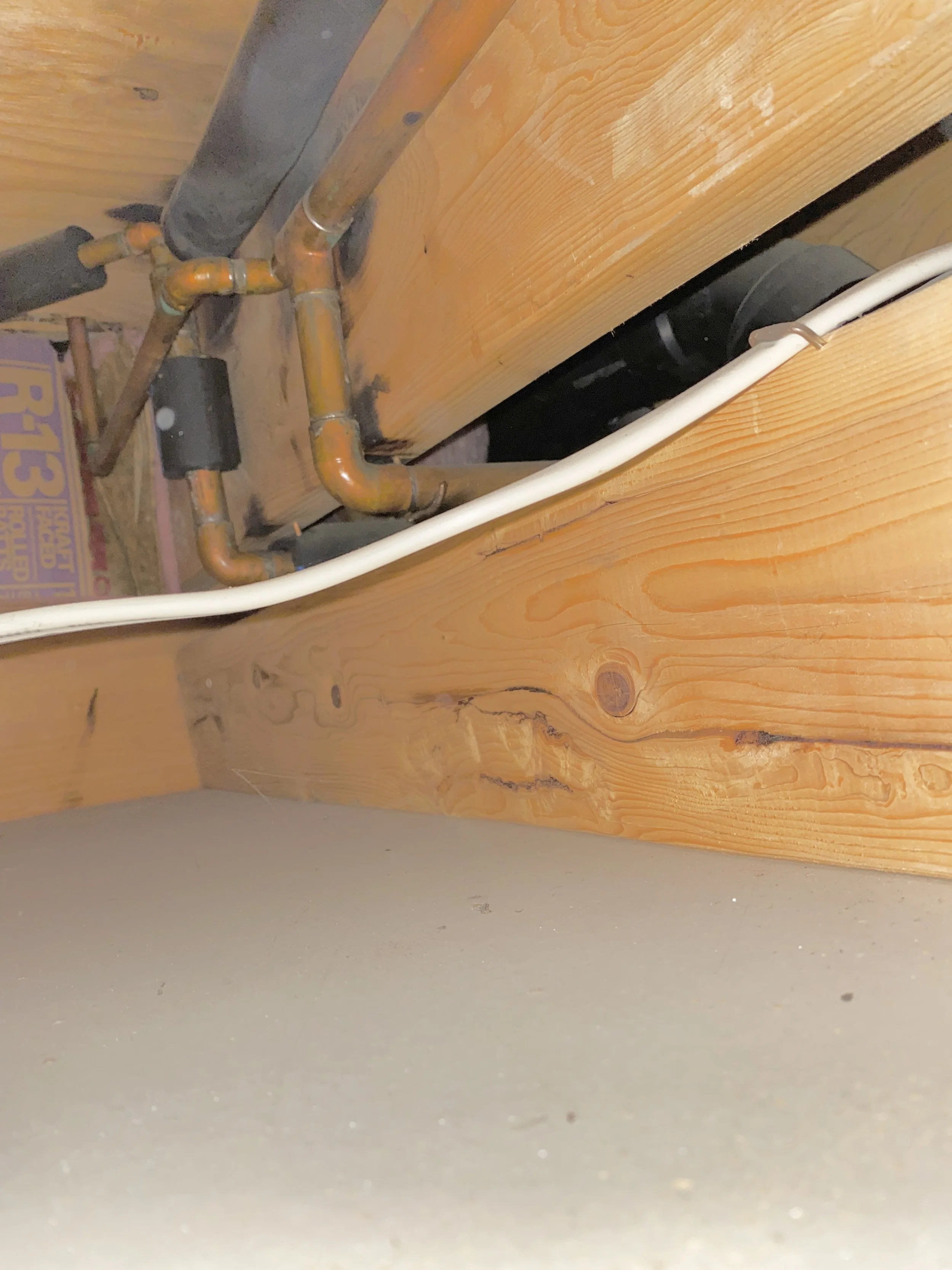 Some plumbing and electrical--needing maybe a 3/4" gap... so that isn't it.