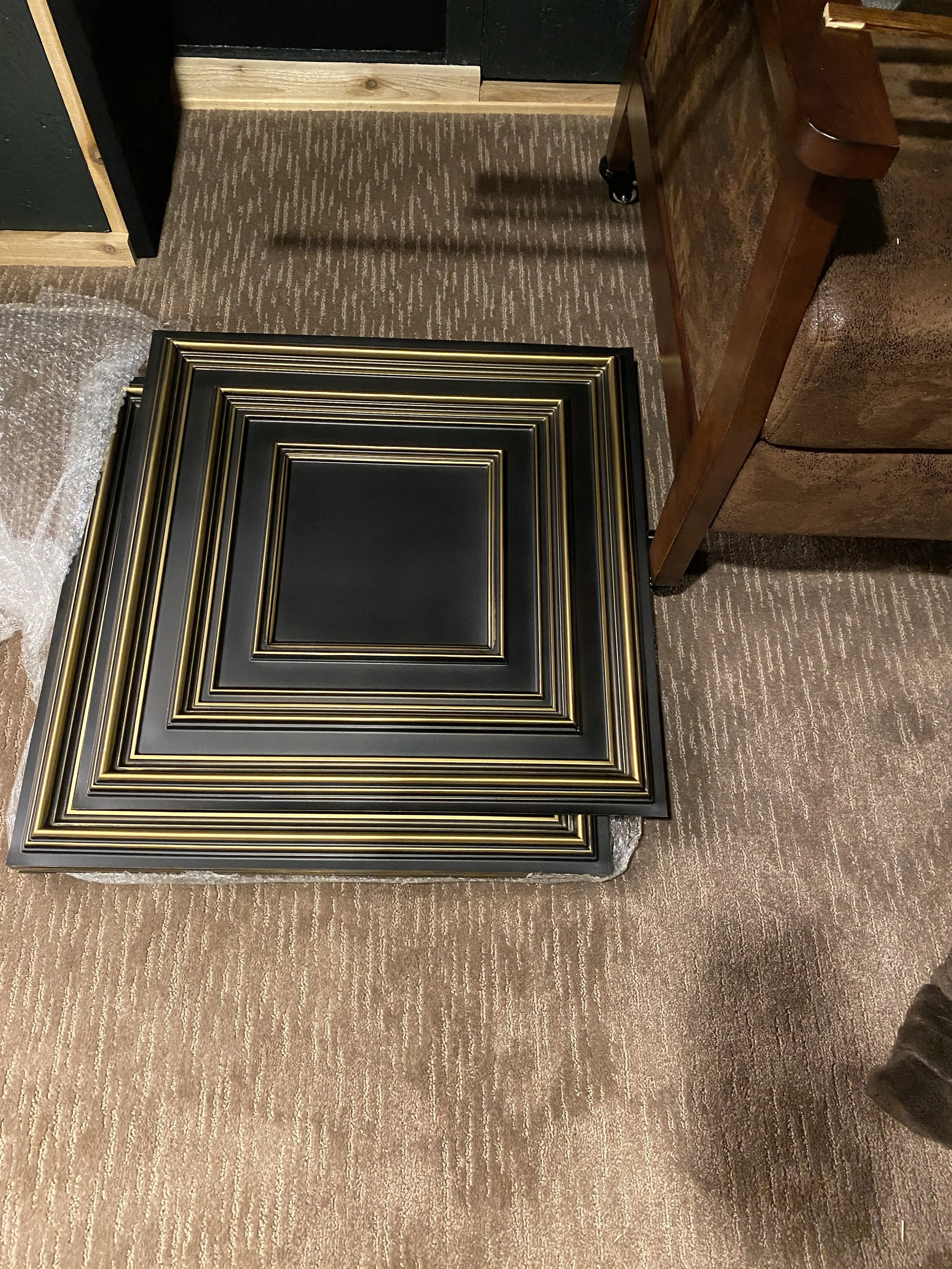 Vinyl ceiling panels--super easy to work with, they cut with scissors and just glue up!