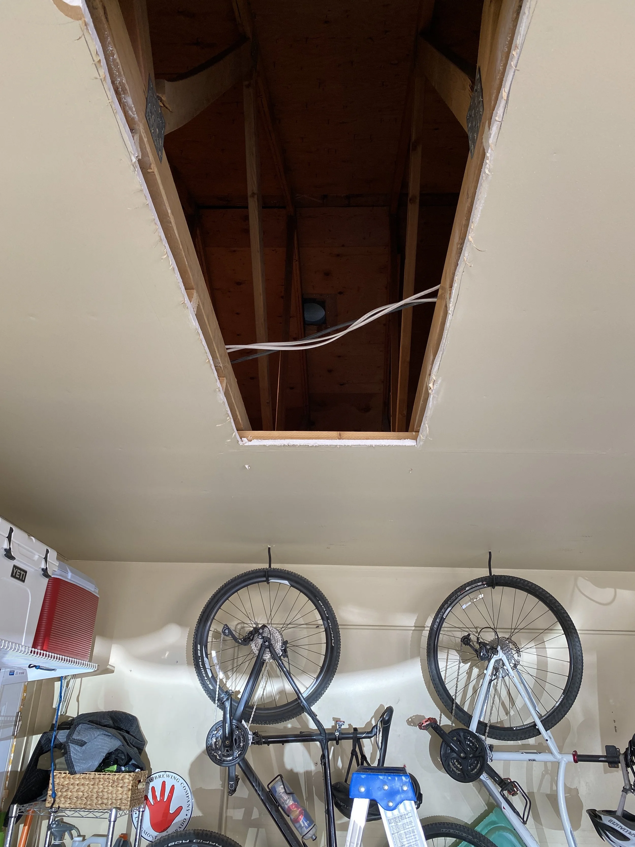 Cut the hole in the ceiling (what would I do without my Sawzall?)...