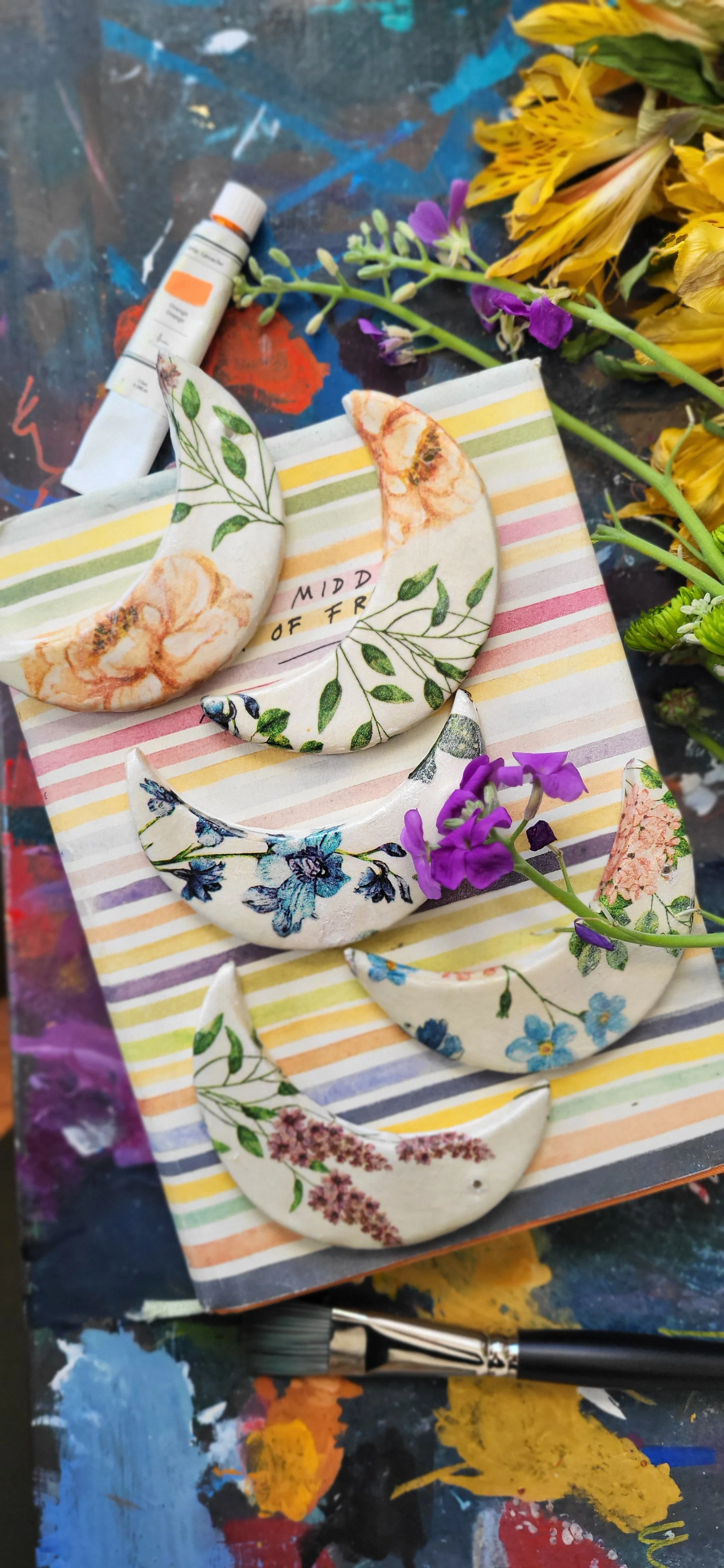 clay moon rnaments with tissue paper