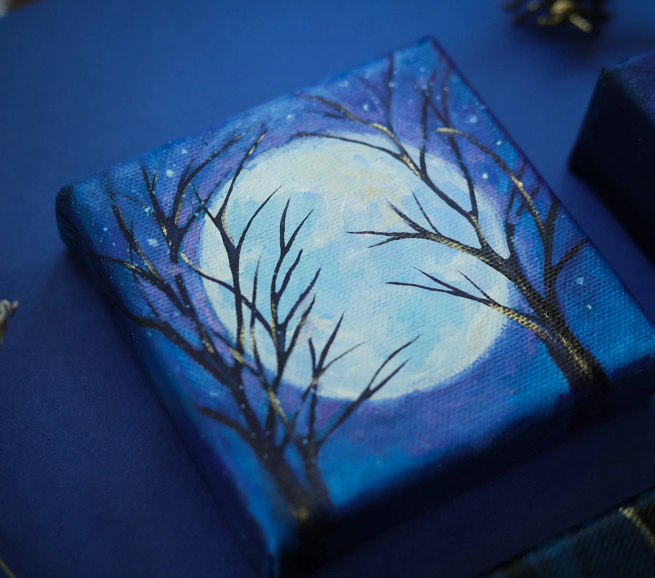 moon oil painting in blue and purple colors