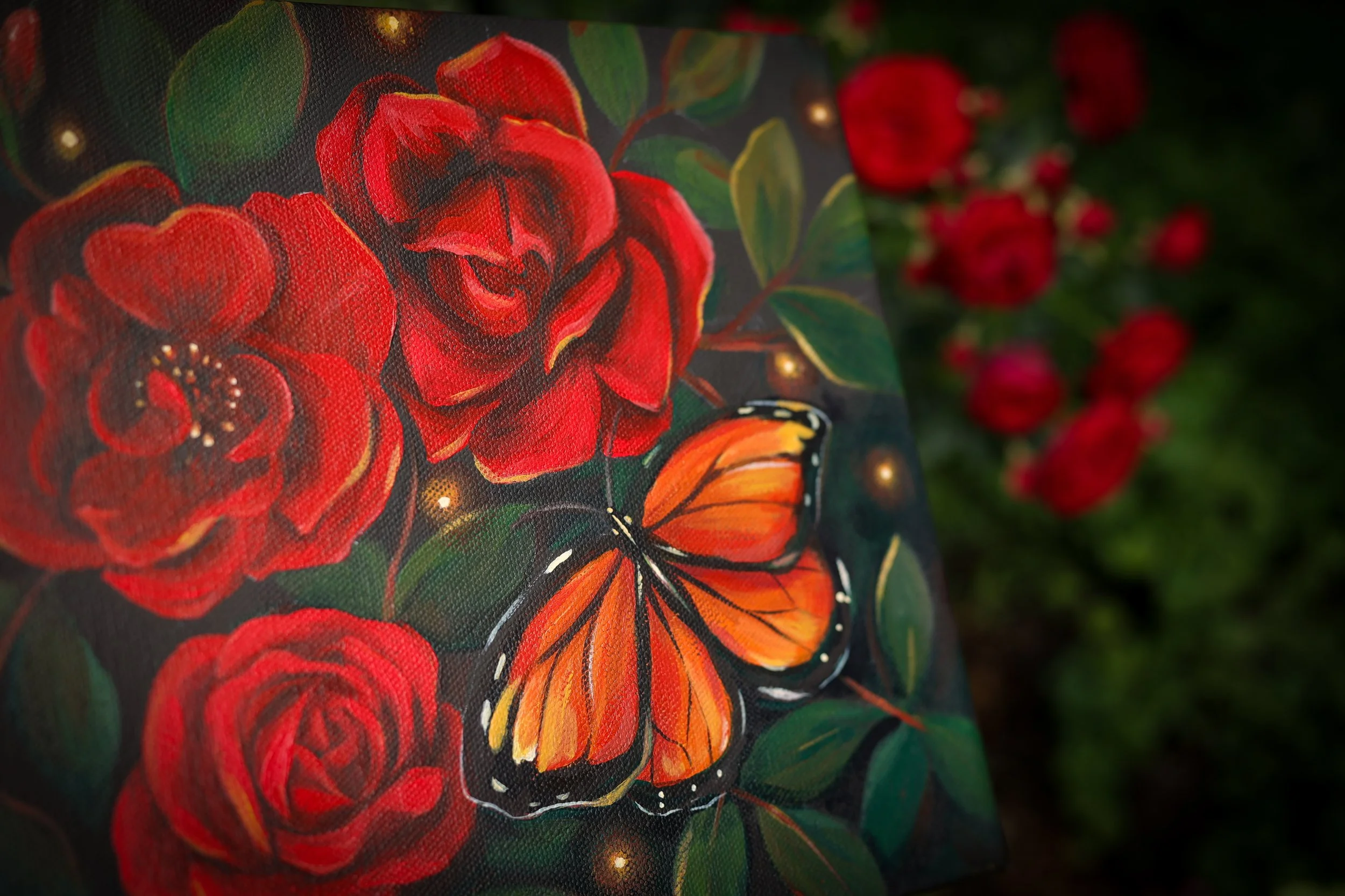 monarch butterfly painting and red roses