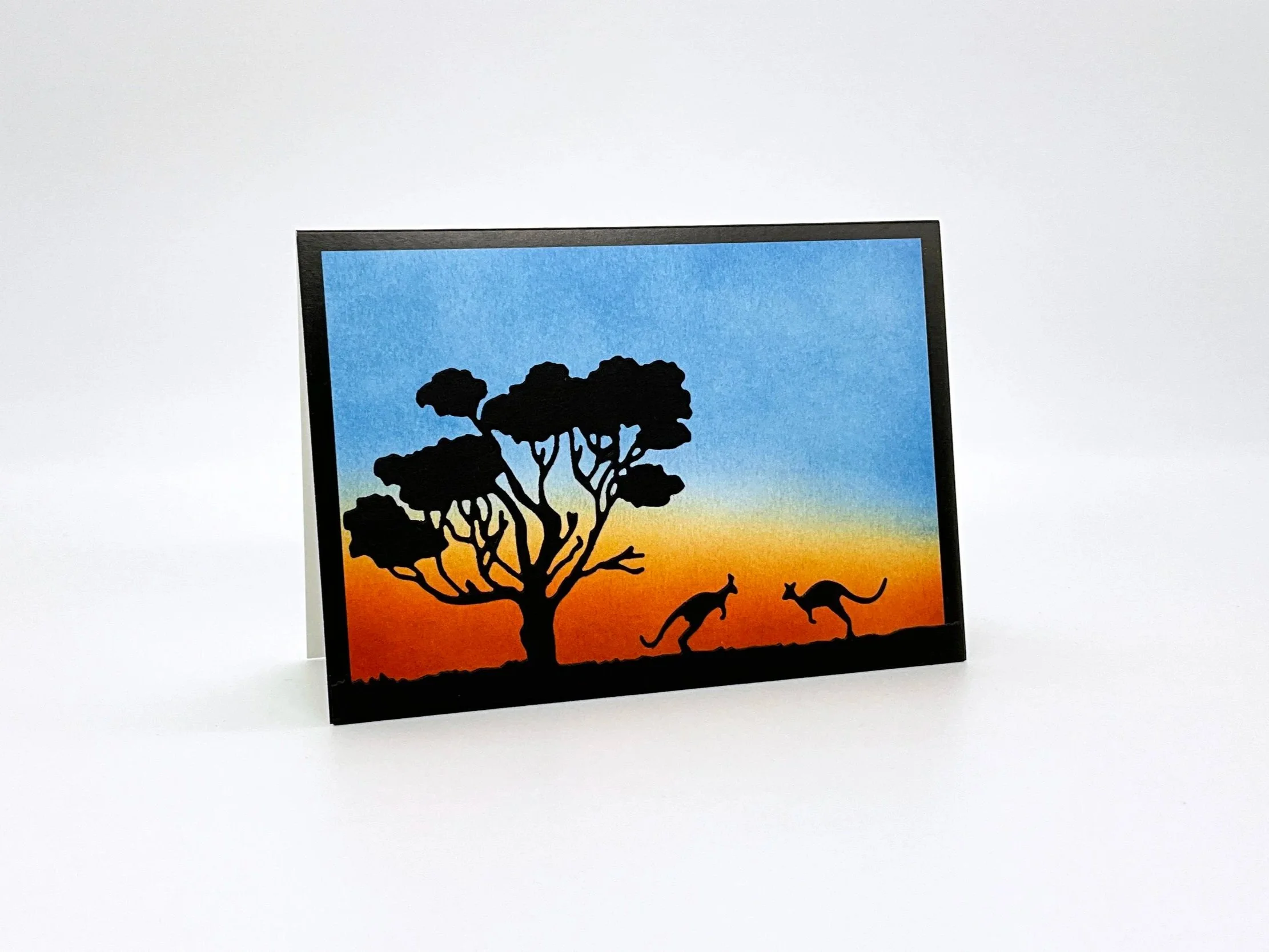 Two kangaroos at dusk