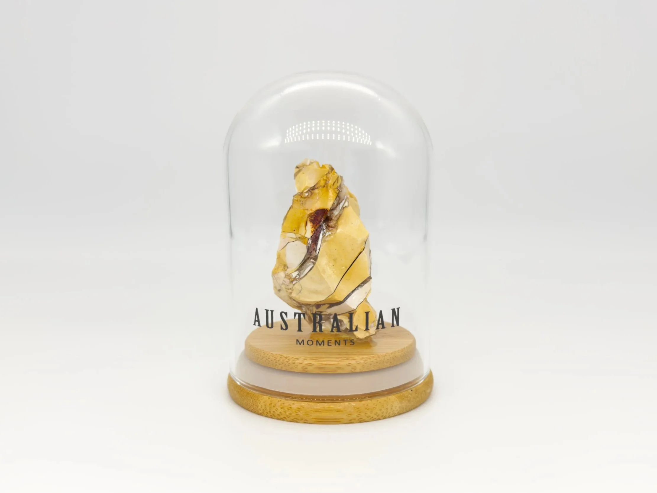 Brecciated mookaite chunk in glass jar