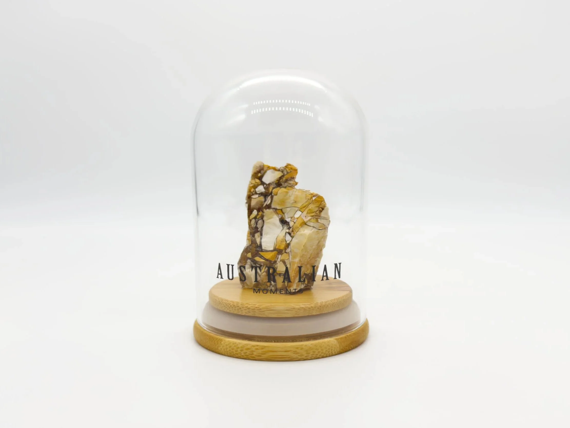 Brecciated mookaite chunk in glass jar