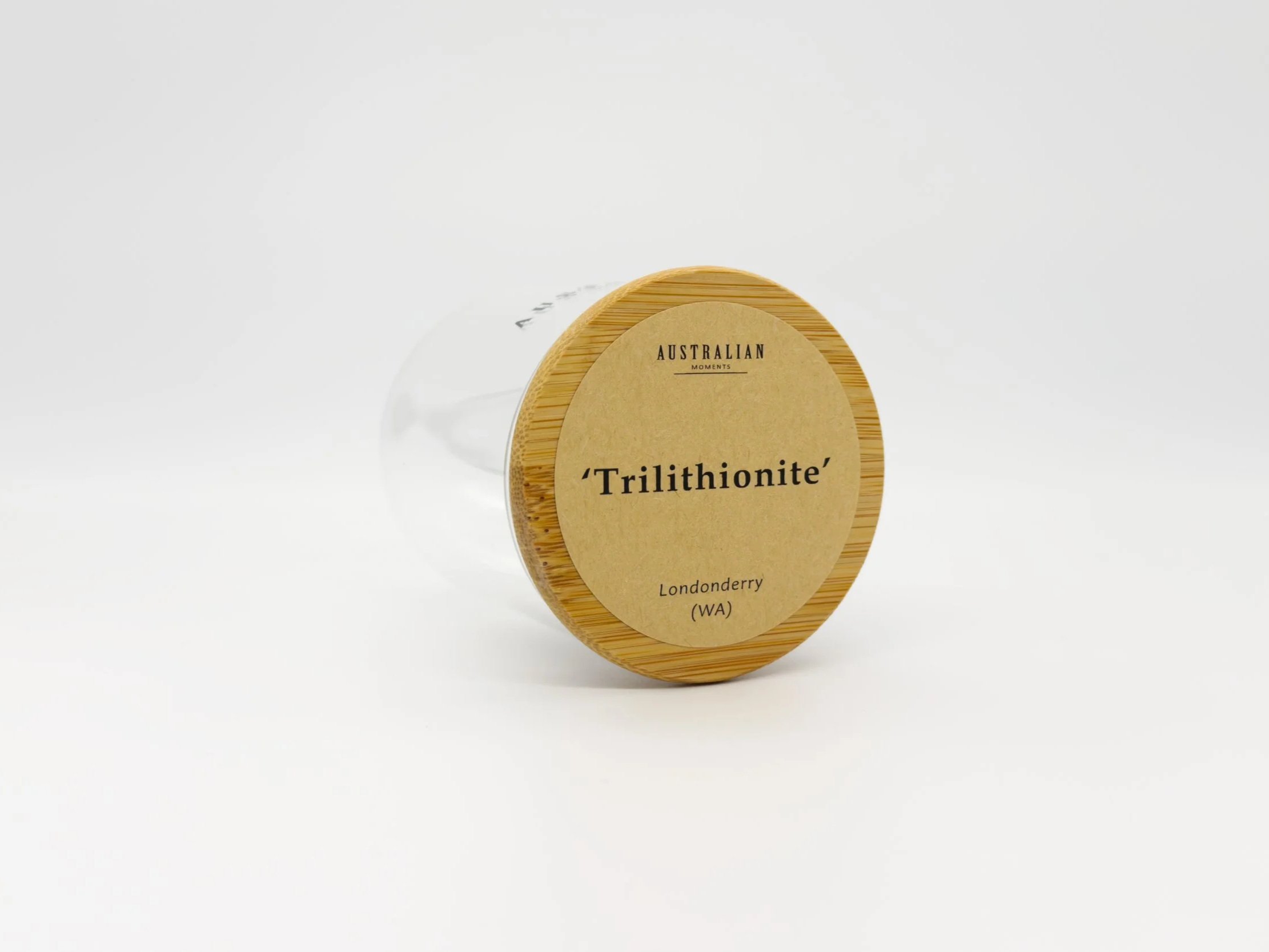 Trilithionite chunk in glass jar
