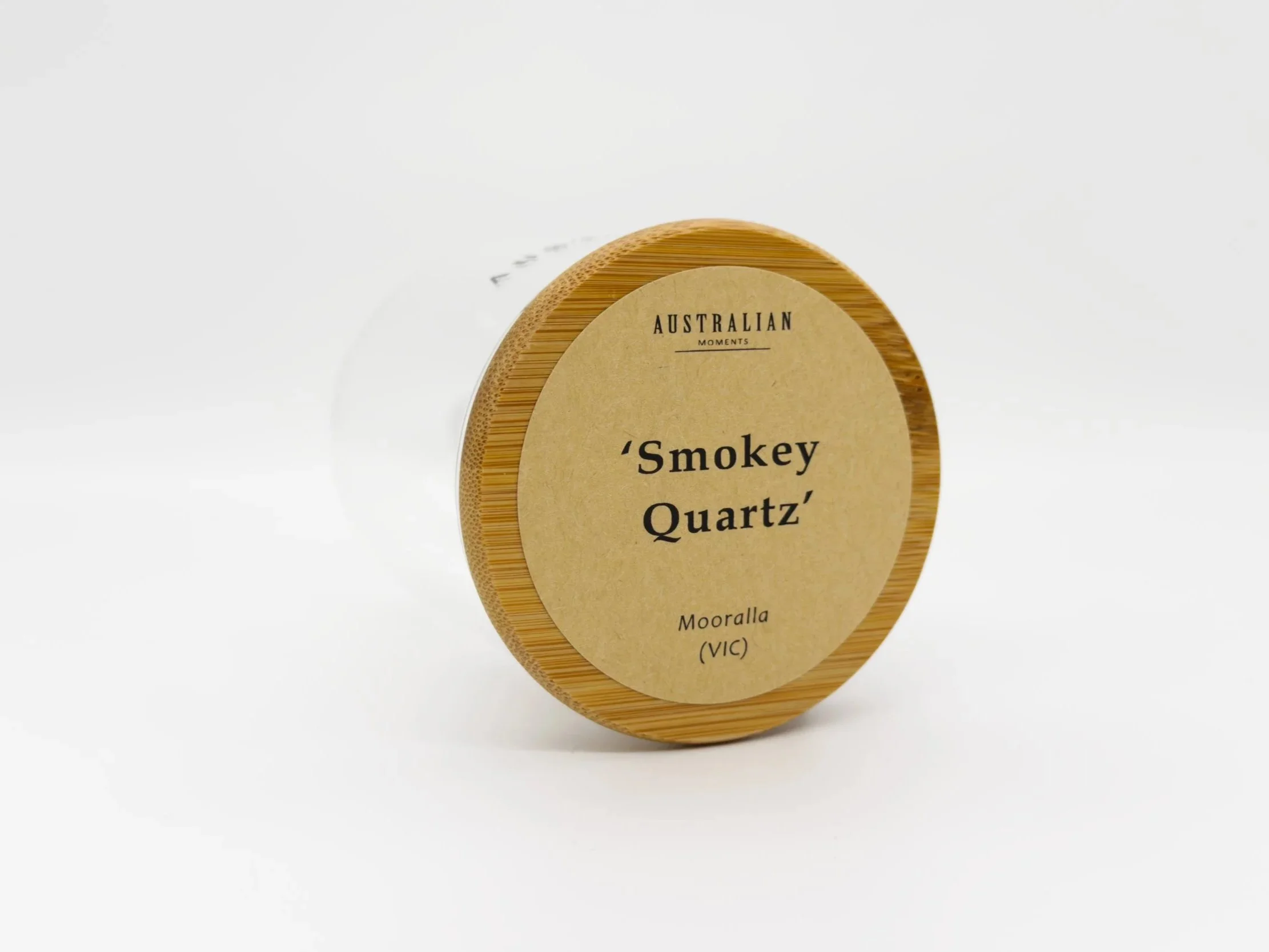 Smokey quartz chunk in glass jar