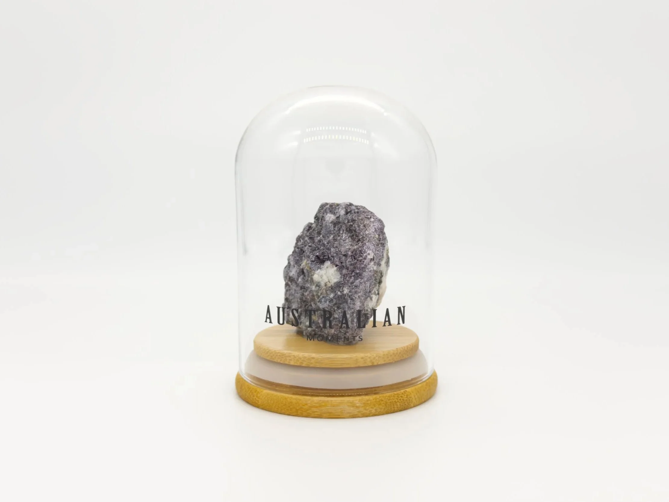 Trilithionite chunk in glass jar