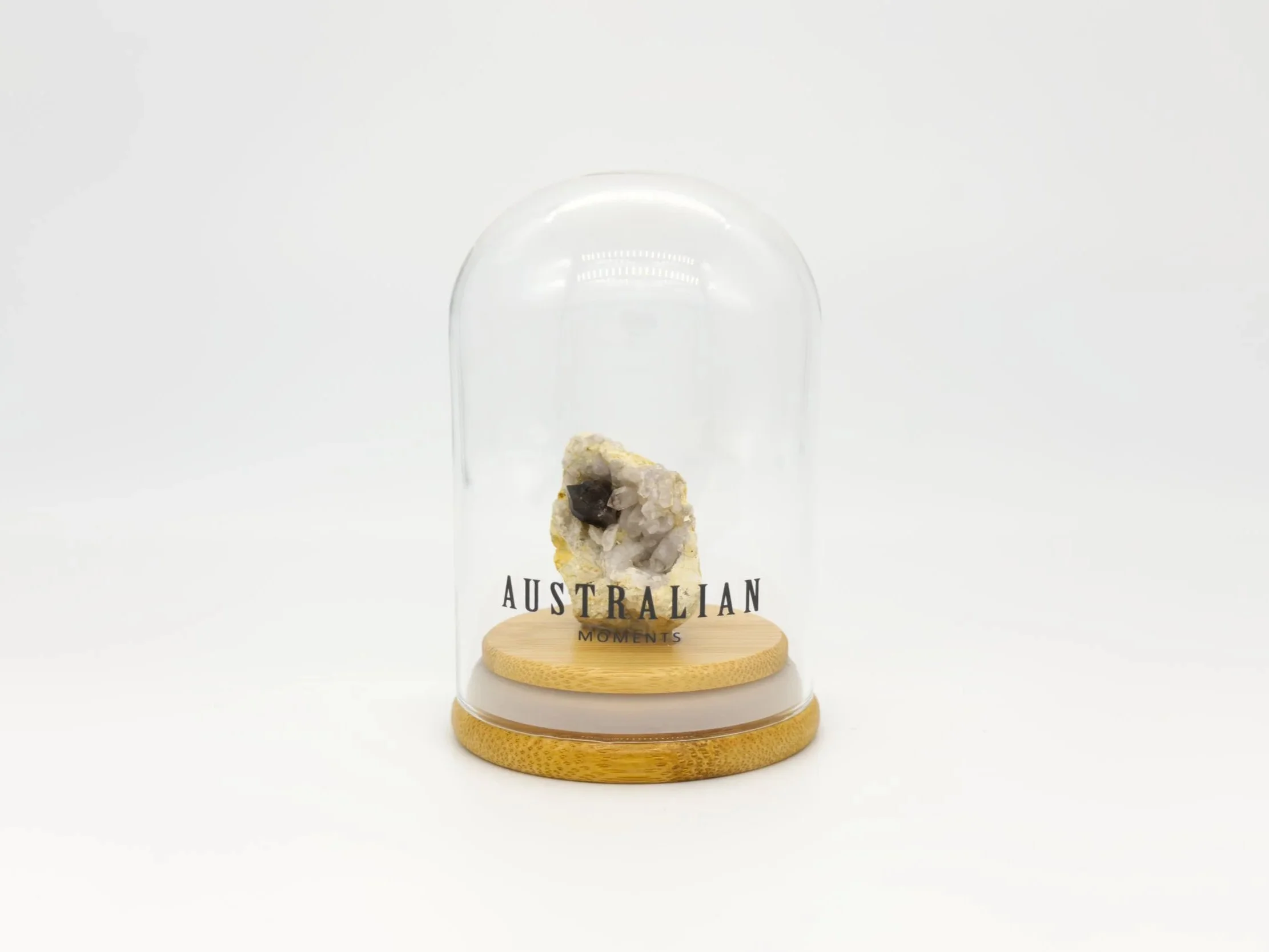 Smokey quartz chunk in glass jar