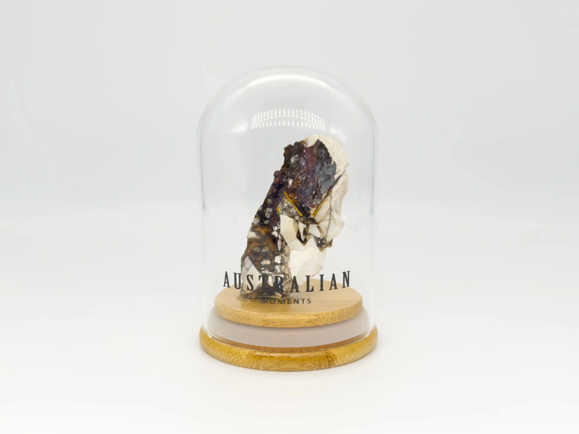 Brecciated mookaite chunk in glass jar
