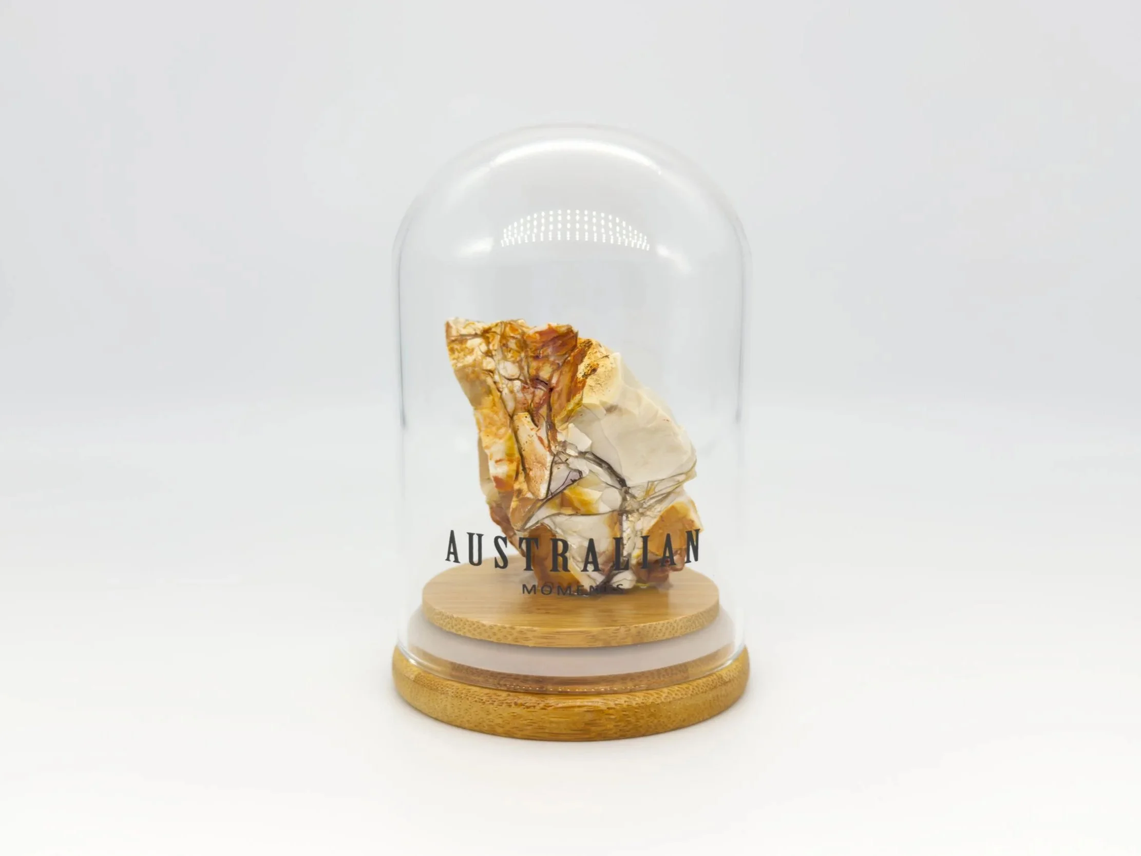 Brecciated mookaite chunk in glass jar