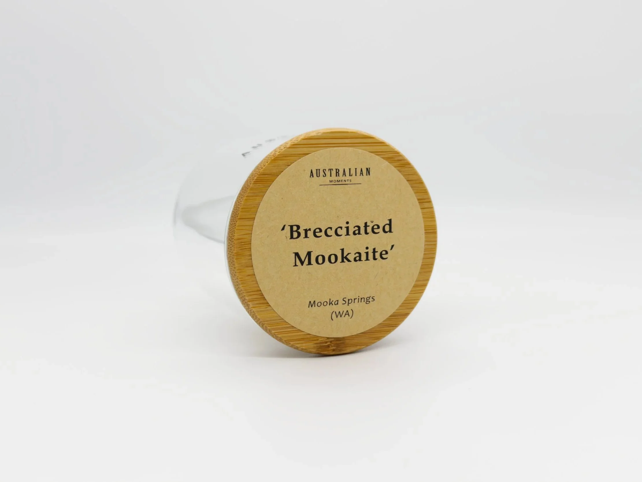 Brecciated mookaite chunk in glass jar