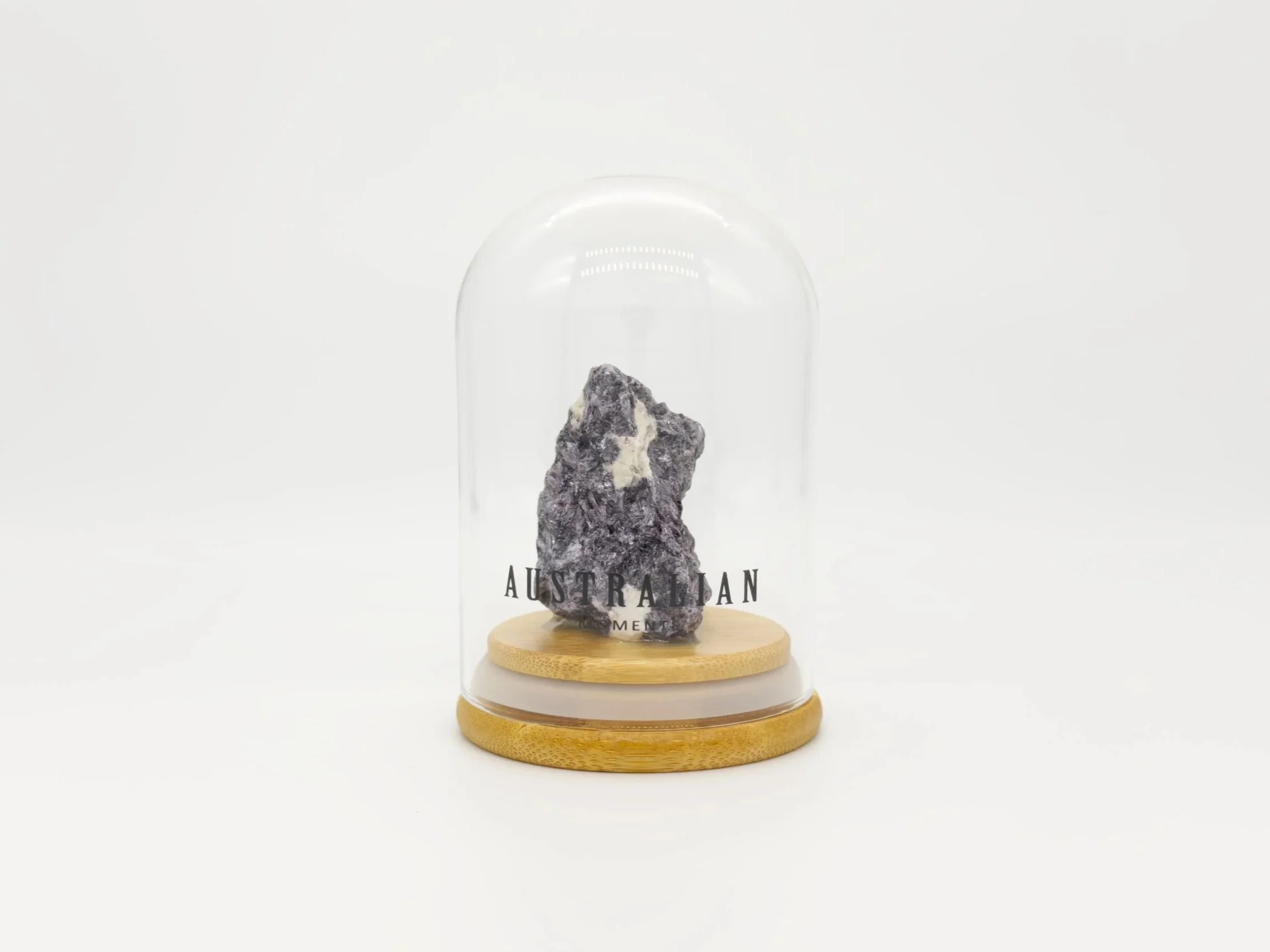 Trilithionite chunk in glass jar