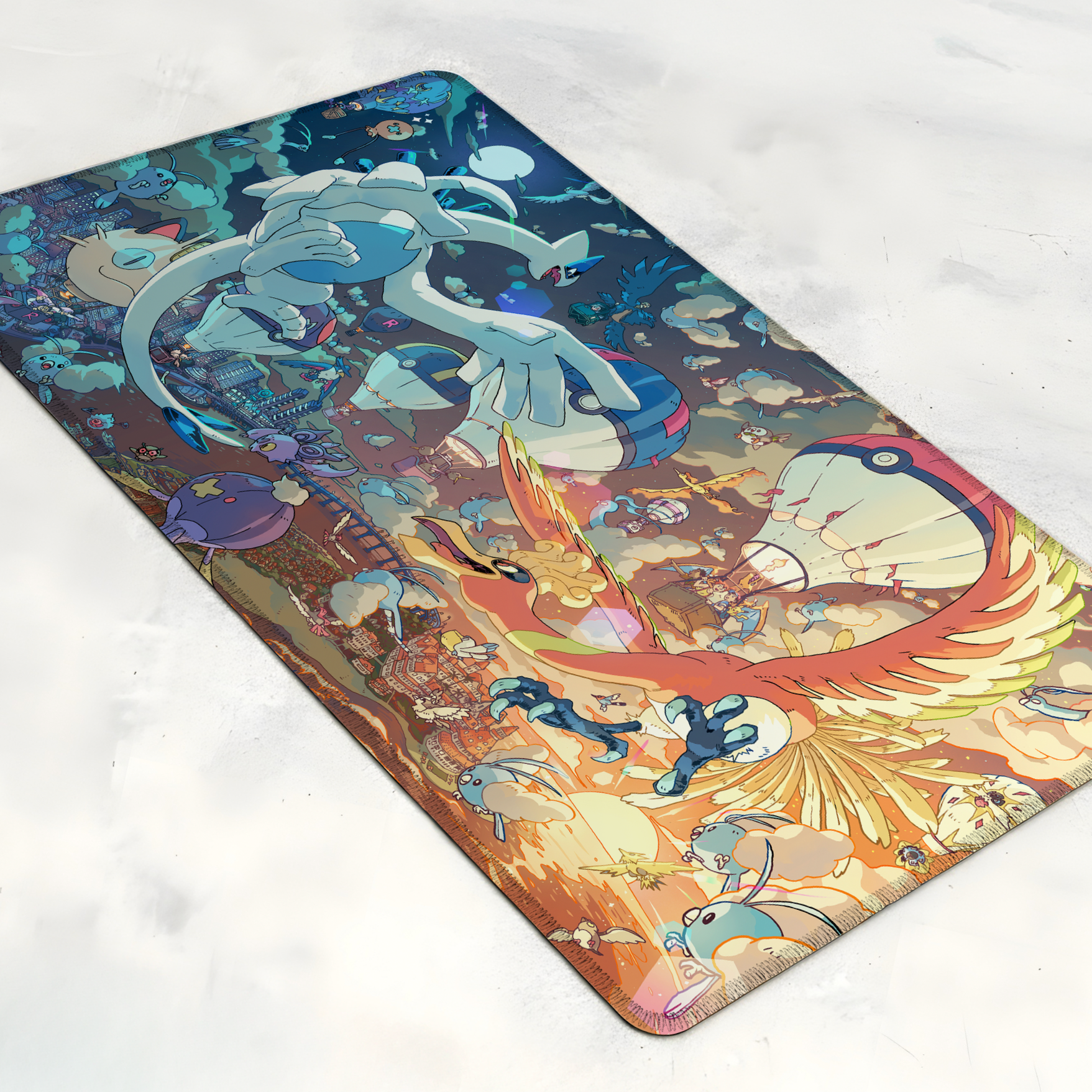 A colorful Pokémon artwork featuring Lugia and Ho-Oh and other Pokémon in a dynamic scene with clouds and an energetic background.