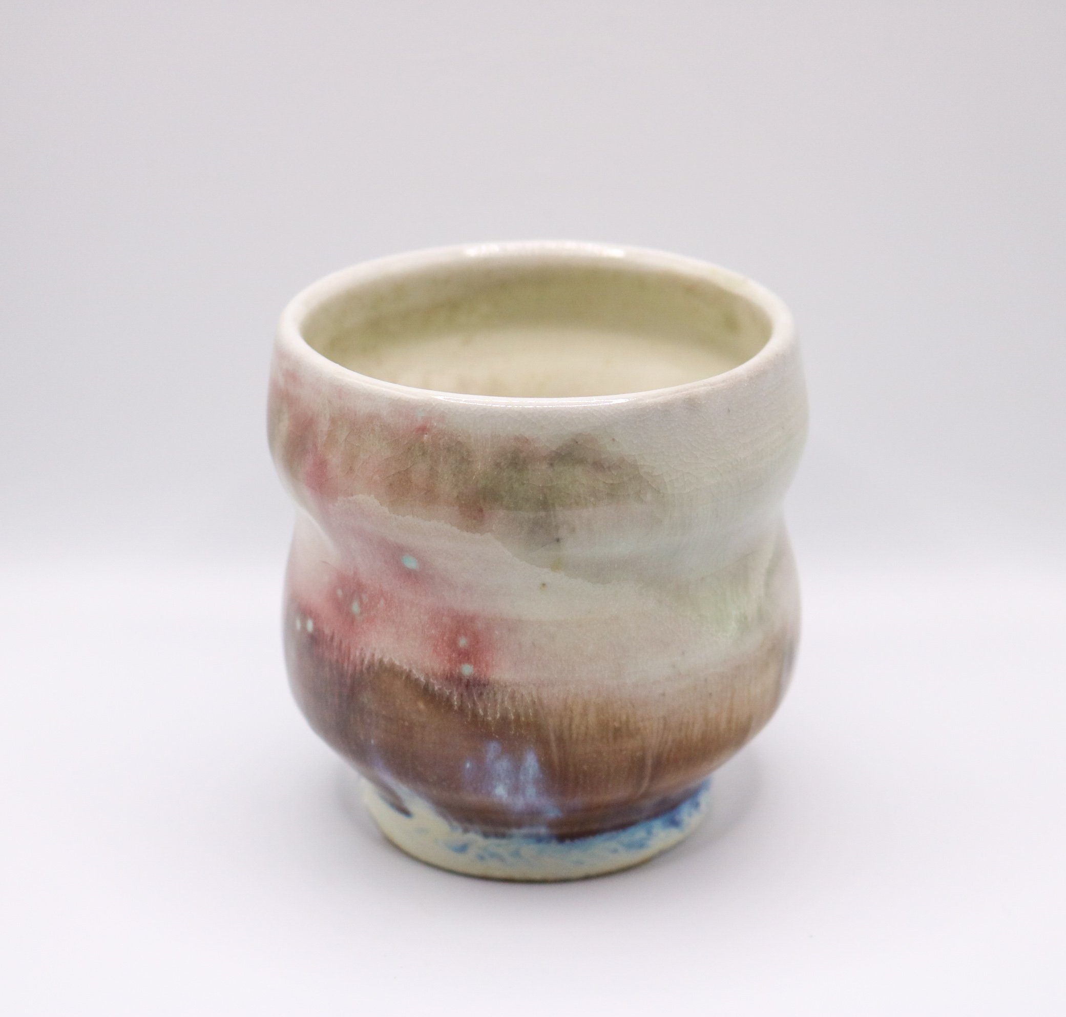 wheel thrown cup | soda fired porcelain and glaze | 2025