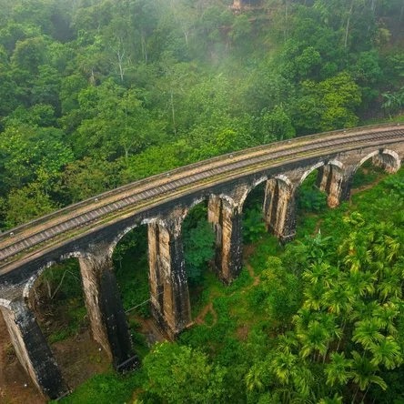 Explore Sri Lanka’s breathtaking landscapes, including the famous Nine Arch Bridge in the tea country.