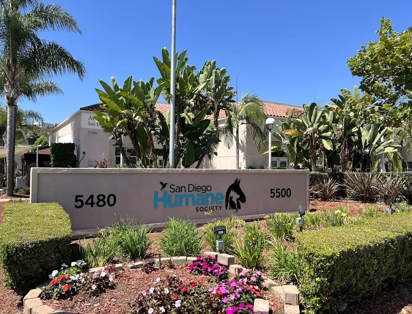 exterior photo, sunny and the sign states its the san diego humane society