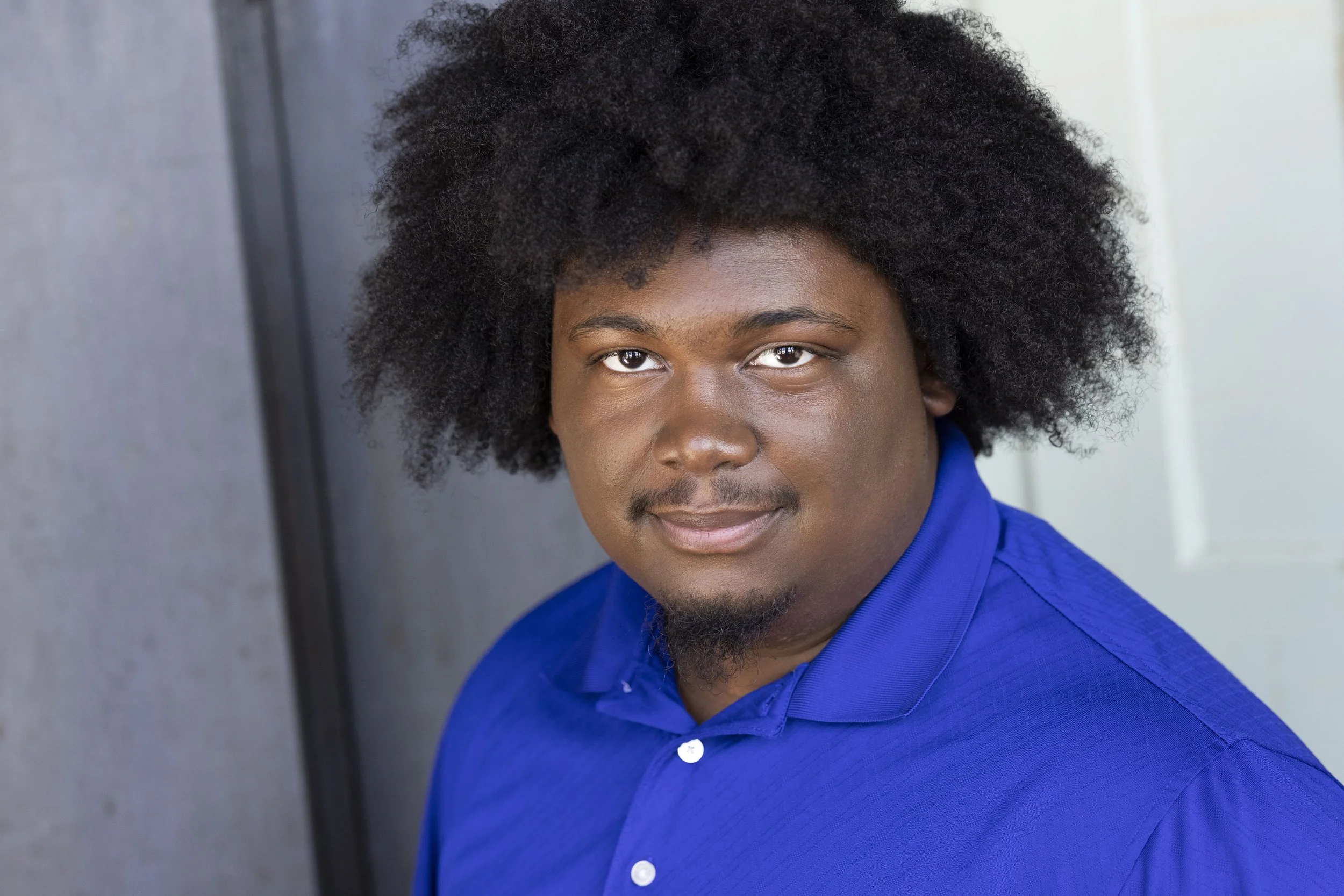 Headshot by Chris Popio