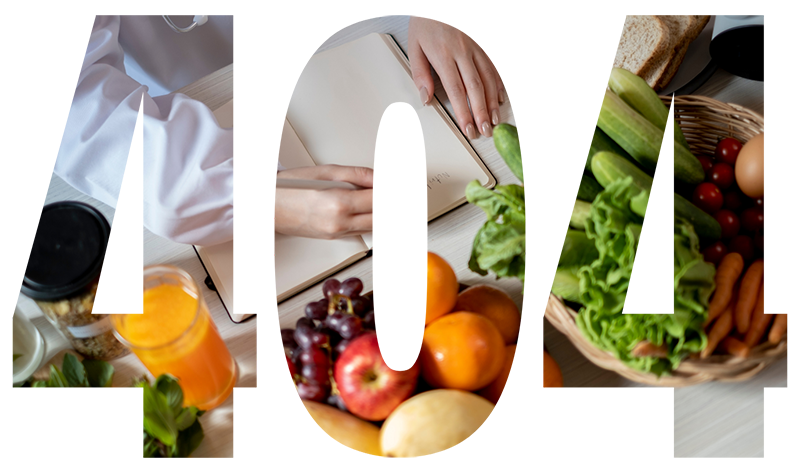 Variety of fresh fruits, vegetables, and a person writing in a book, possibly at a kitchen or dining table.
