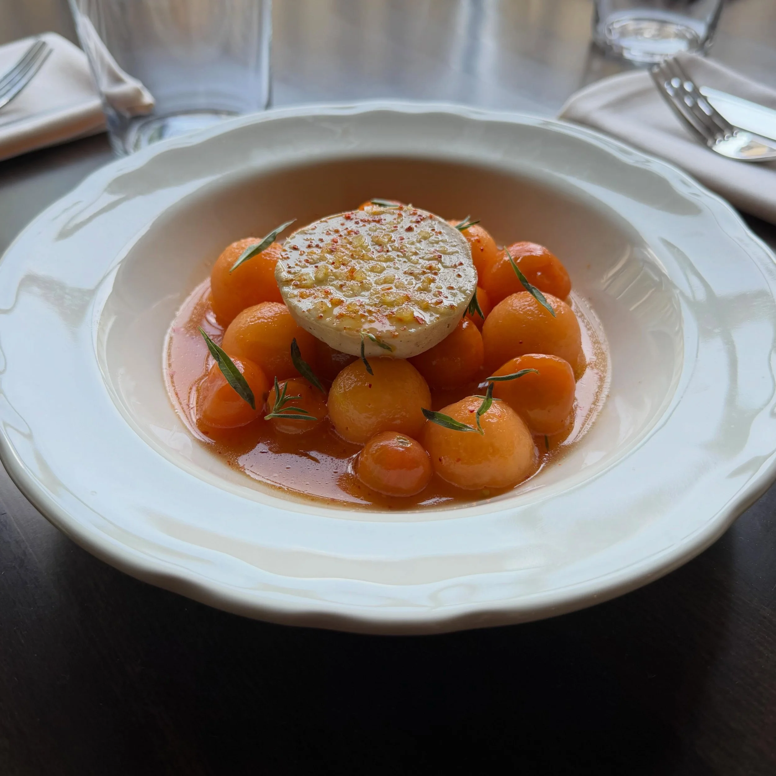 Our newest foie gras dish highlights the best of both tomato and melon season here in the Midwest. 

Foie Gras Torchon with tomato brandy, melon, sungolds, honey &amp; espelette