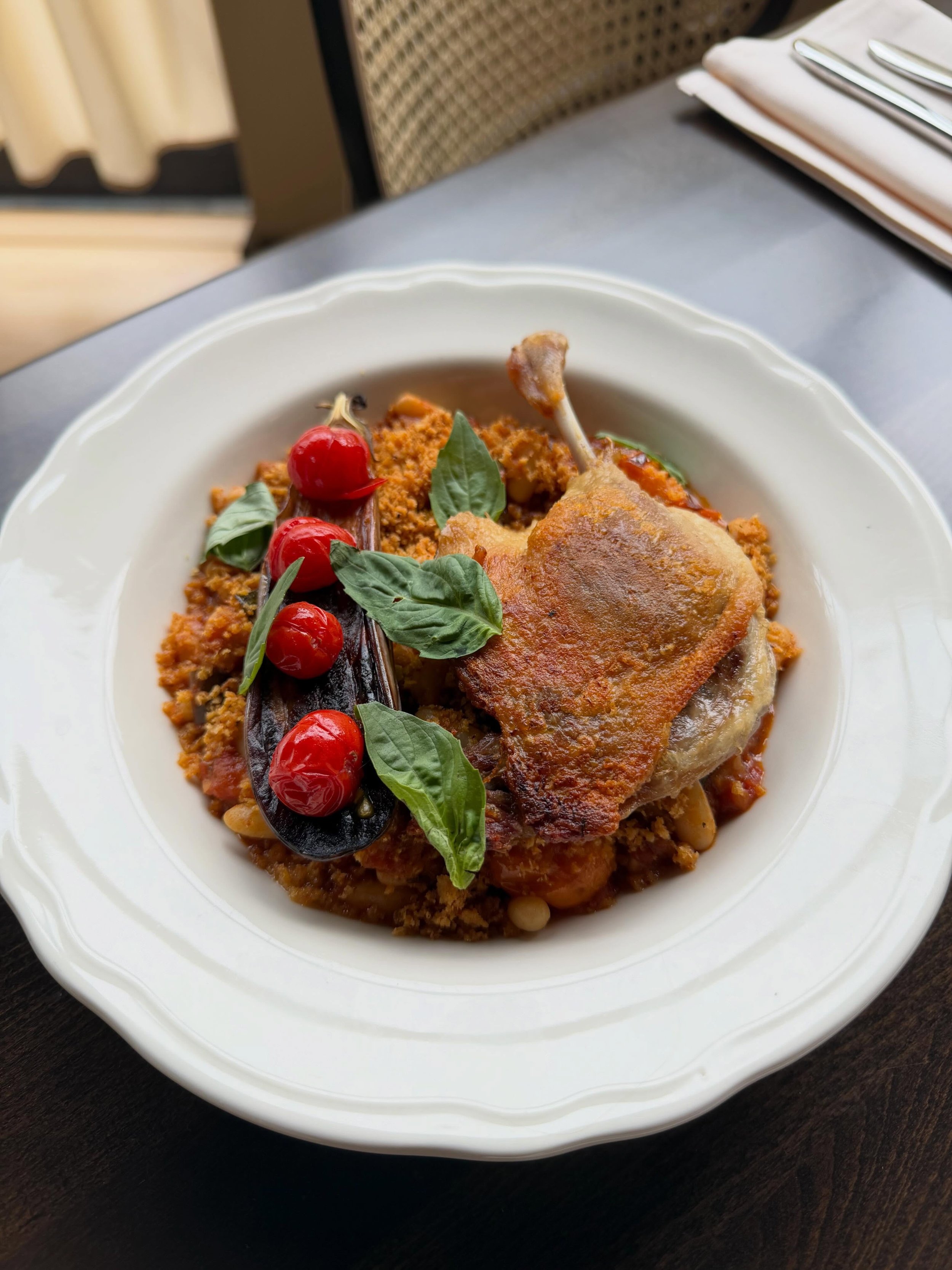 Matt&rsquo;s Cherry Tomatoes (grown for us @waxwingfarmmn 🍅) have been adding beautiful, sweet, summer pops all over our menu. Now they are the finishing touch on one of our newest dishes. 

Duck Leg Confit with ratatouille, flageolet beans &amp; br