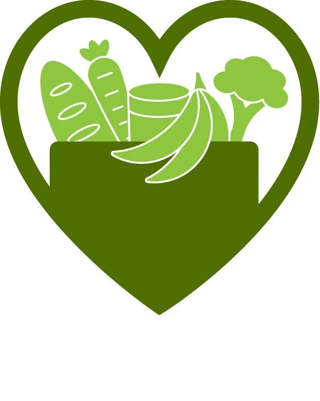 A green heart-shaped logo featuring illustrations of carrots, bananas, broccoli, and other vegetables inside.