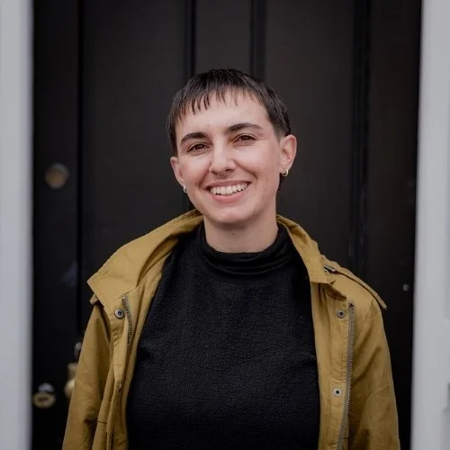 Portrait of Alanna Audus, lived experience therapist and clinical social worker at Inclusive Minds Counselling.