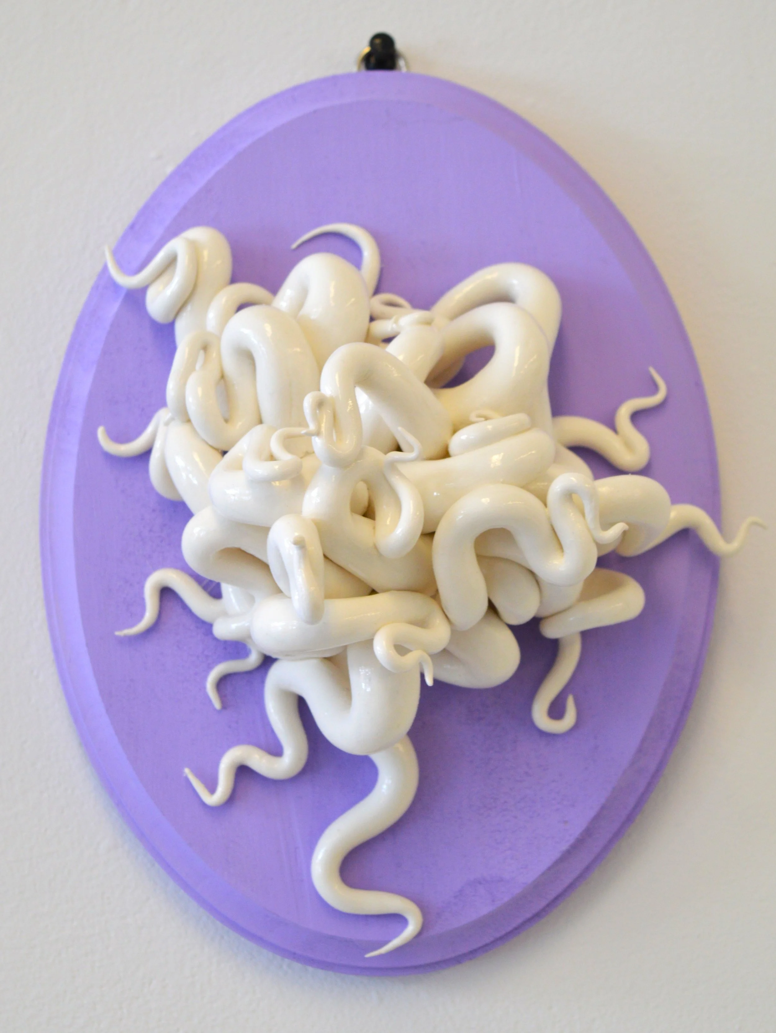 Aesthetic Discomfort, model magic, spray paint, acrylic paint, basswood, high gloss sealant, March 2025, 7”x5”