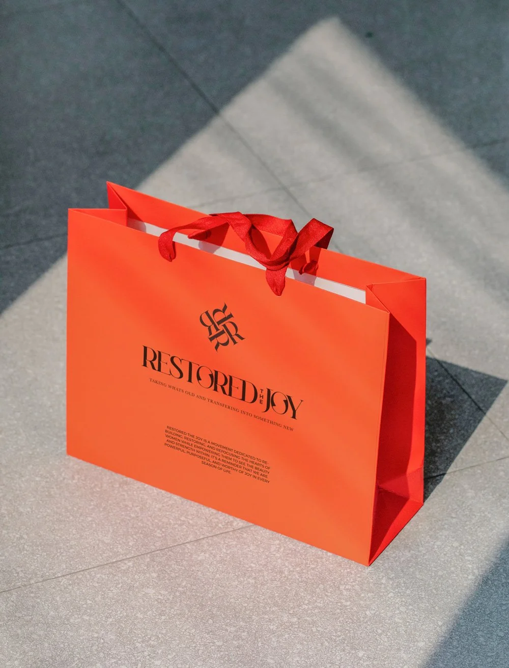 Logo_Mockup_Orange_Bag_11609.jpg