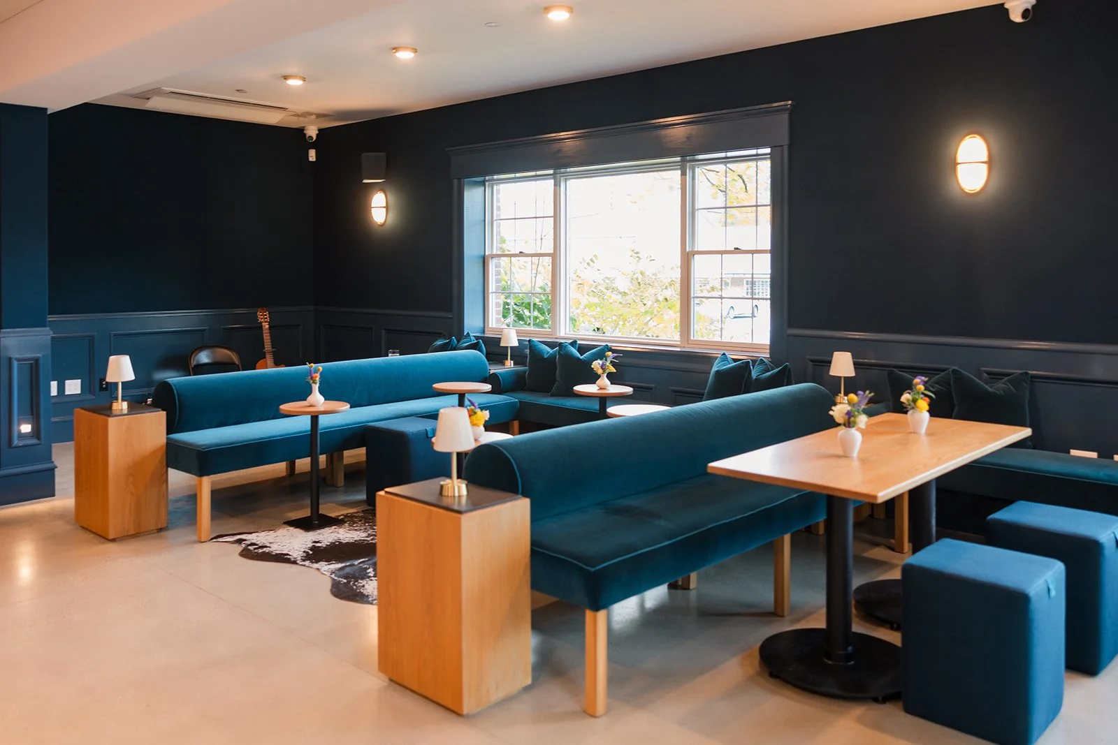 Join us at the bar where we have comfy banquettes or set up the room as you'd like.