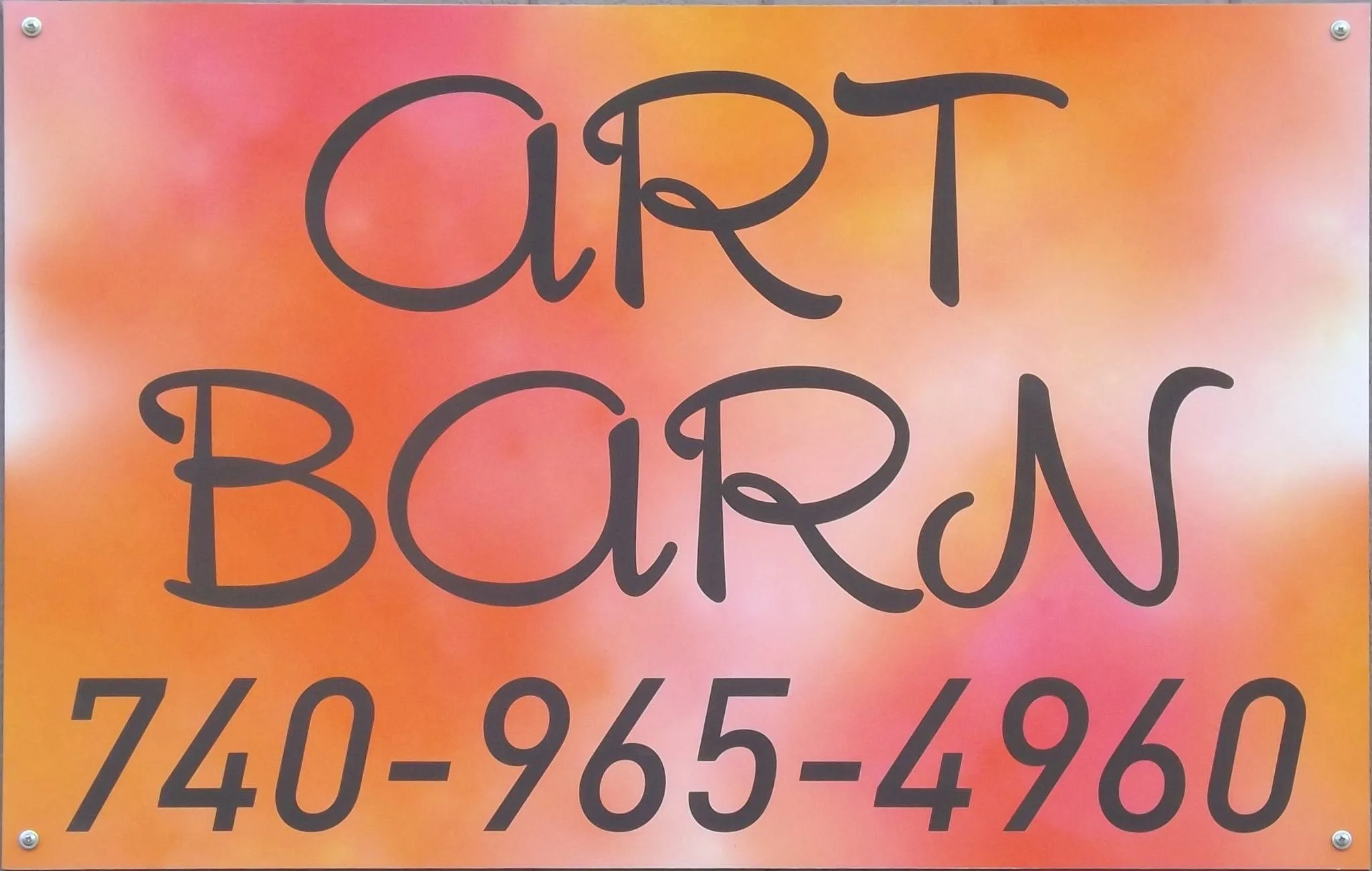 Sign for Art Barn with phone number 740-965-4960 in orange and pink background