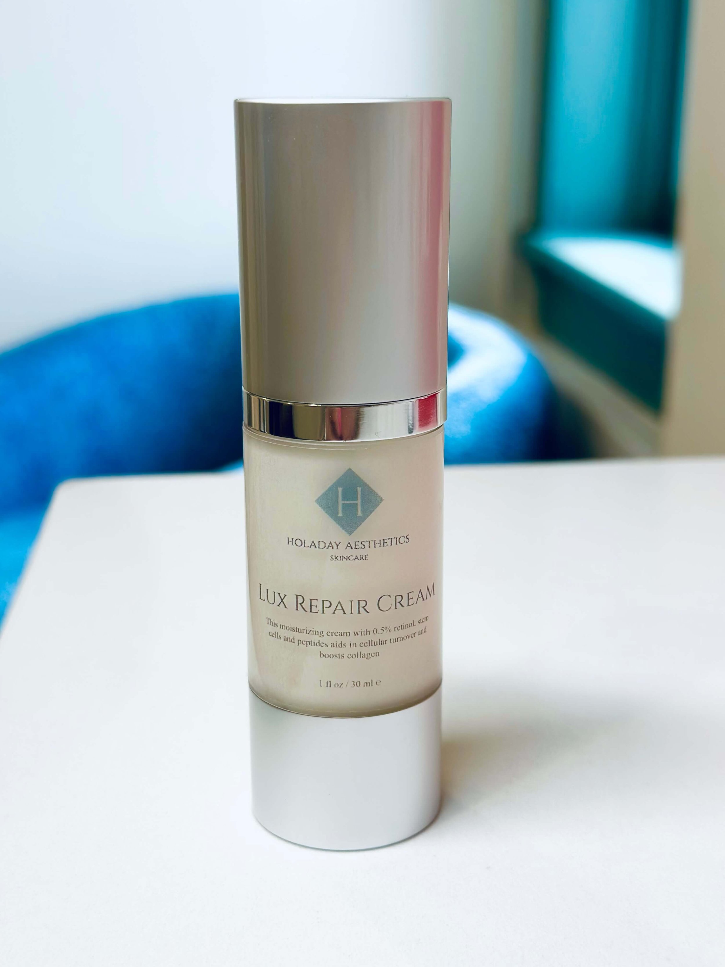 A bottle of Holaday Aesthetics' Lux Repair Cream sold in Parkville