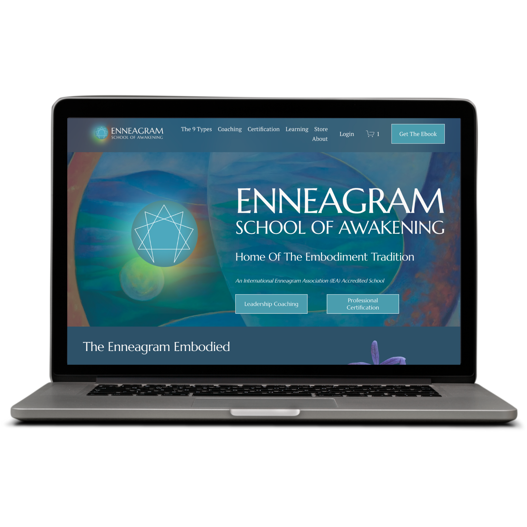 Laptop screen displaying the homepage of Enneagram School of Awakening with menu options and a background of colorful abstract art