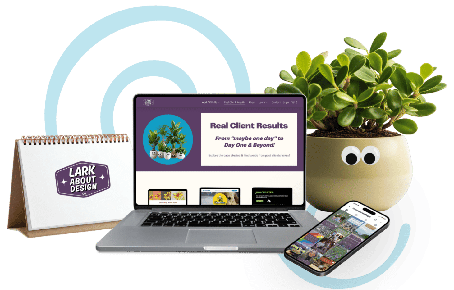 A workspace with a desk calendar displaying 'Lark About Design,' a laptop showing 'Real Client Results' webpage, a smartphone with a photo grid, a potted plant with googly eyes, and a target graphic with concentric circles.