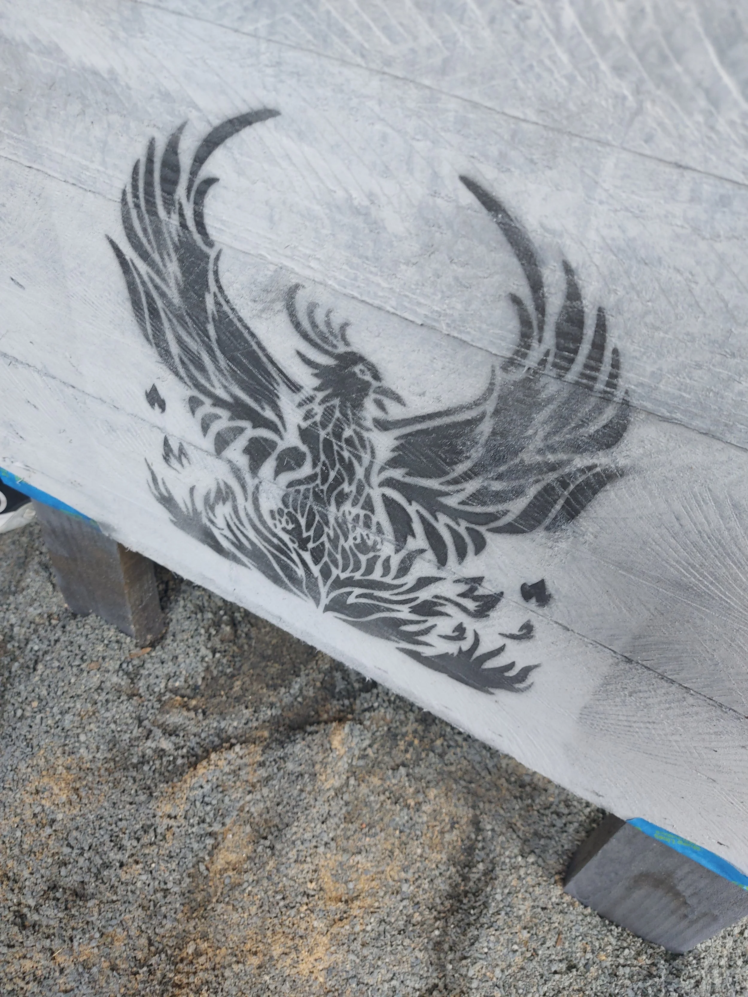 One of our peers did this to one of our planters at the reentry home! Look at the Phoenix!