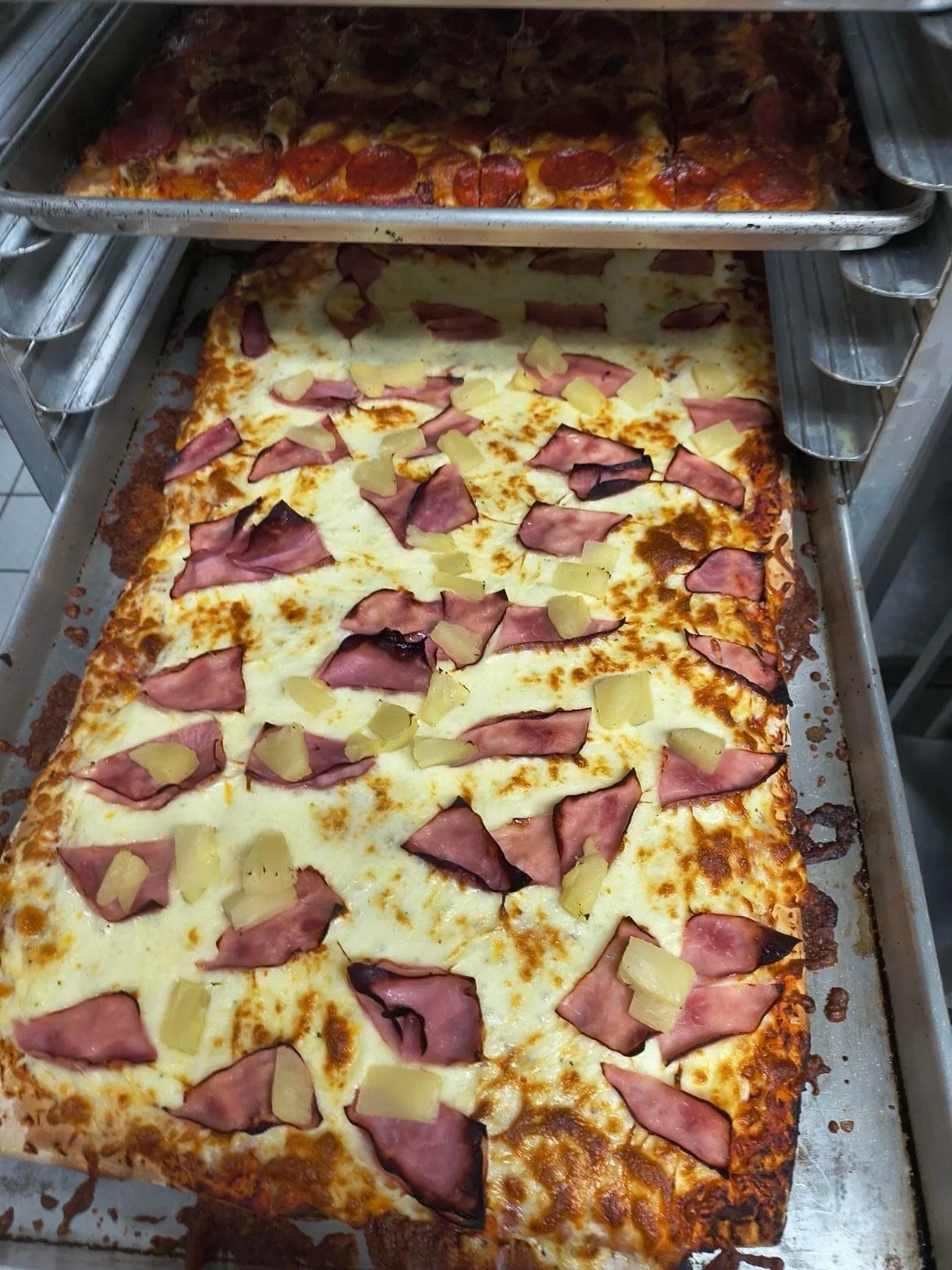 Pizza choices for Kipp Tulsa high school students! 🍕 Would you pick ham with pineapple or supreme pizza? #KeystoneFoodservice