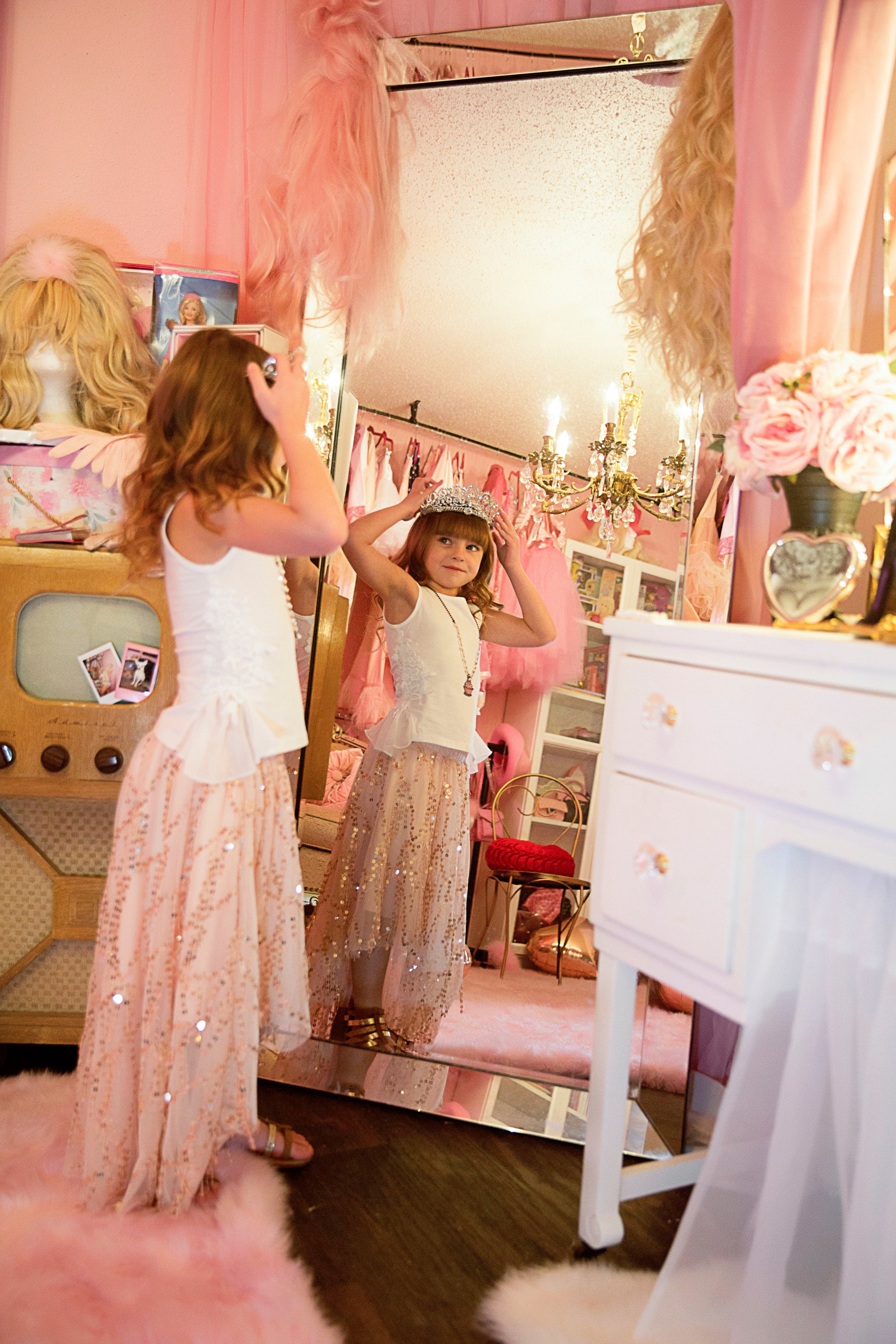Aubree Princess crown looking in mirror.jpg