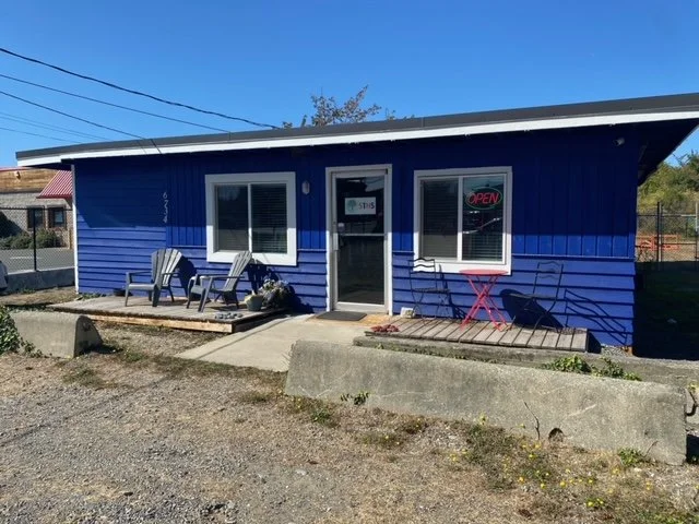 Exterior of the boutique on a sunny day.