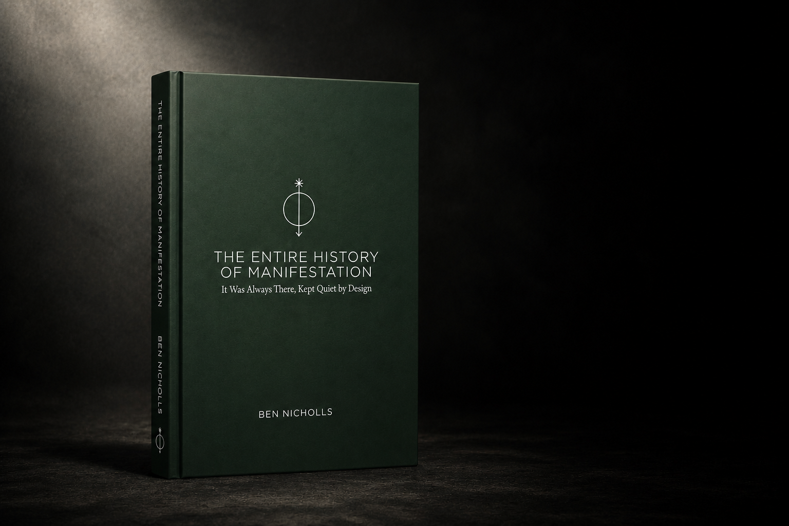 A green hardcover book titled 'The Entire History of Manifestation' by Ben Nicholls standing upright on a dark surface against a black background.