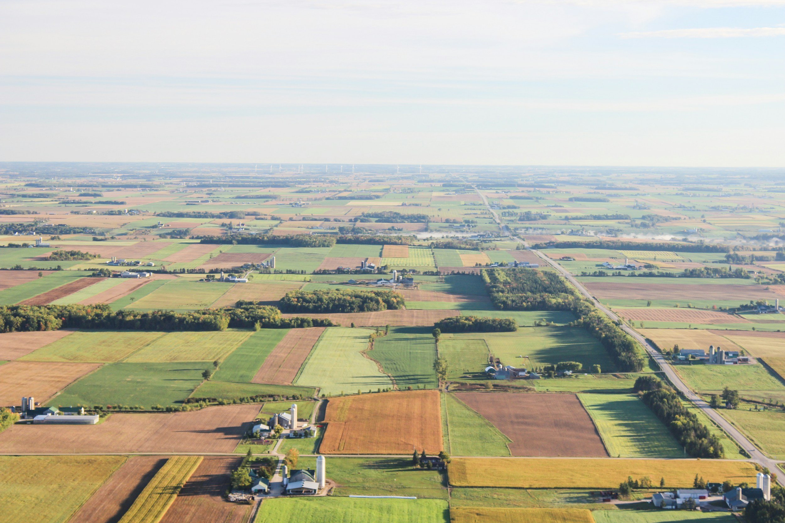 Aerial view of rural farmland representing Clarity Through Community's Rural Reach program