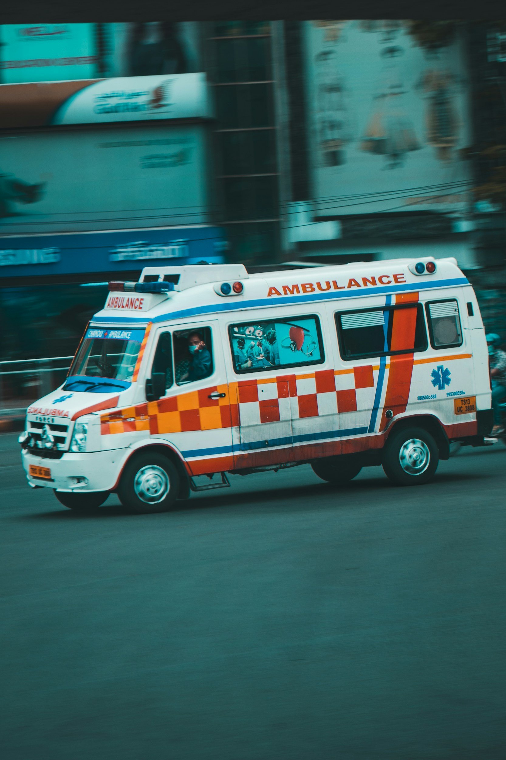 Ambulance responding to an emergency, representing support for first responders through the Frontline Resilience program