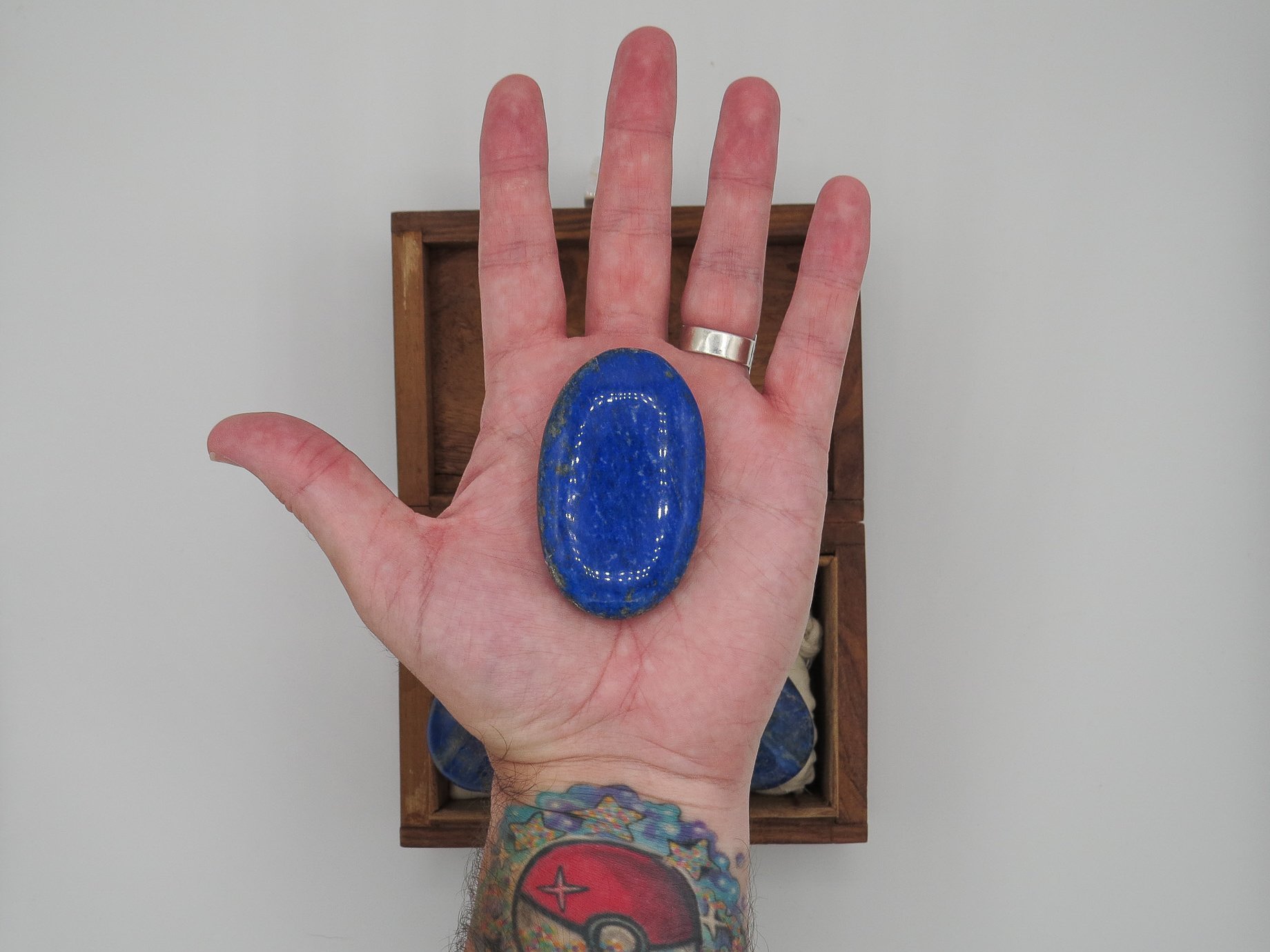 FFMBSBlu187_lapis-lazuli-palm_stones_hand.jpg
