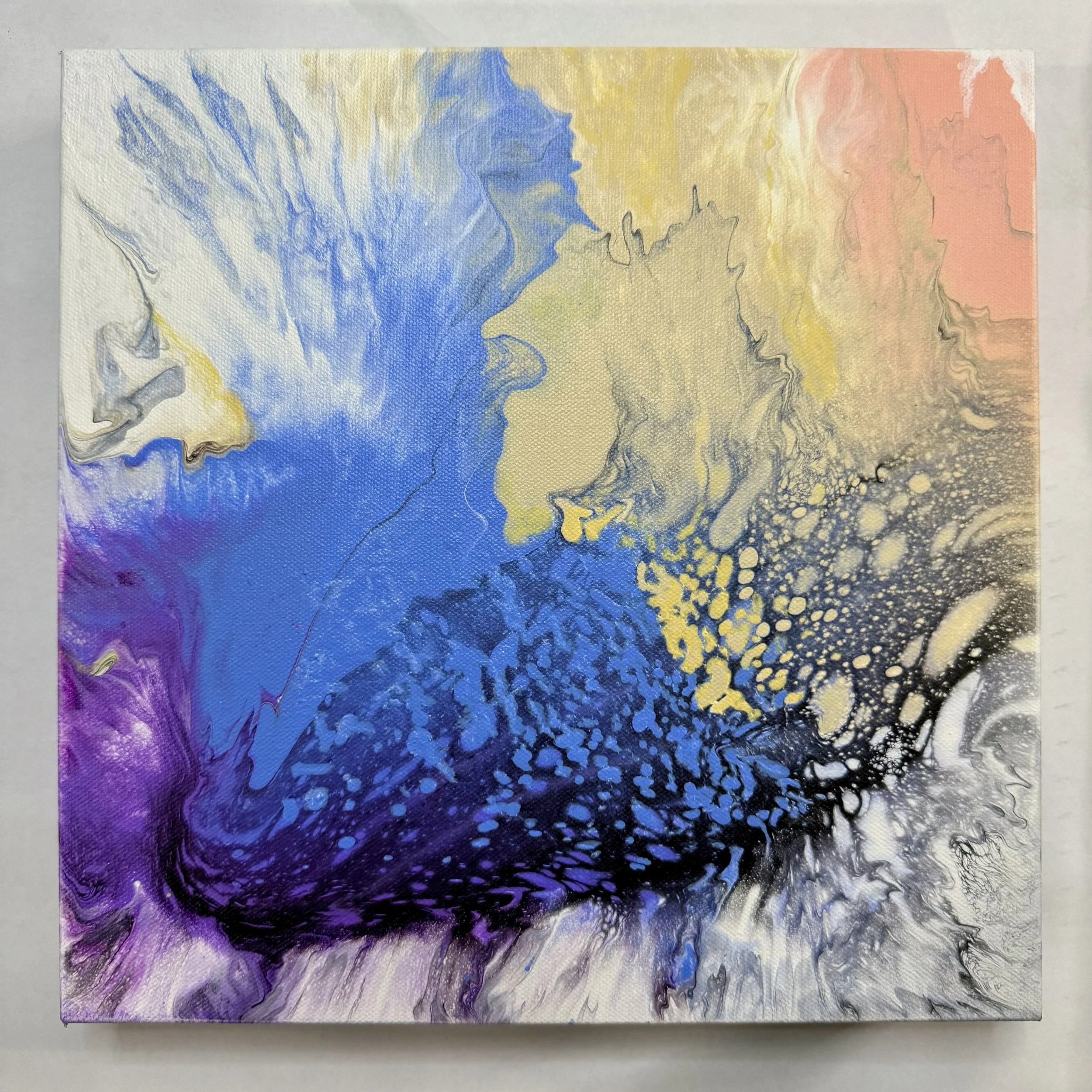 Abstract acrylic painting with swirling patterns of blue, purple, black, white, beige, and pink colors.