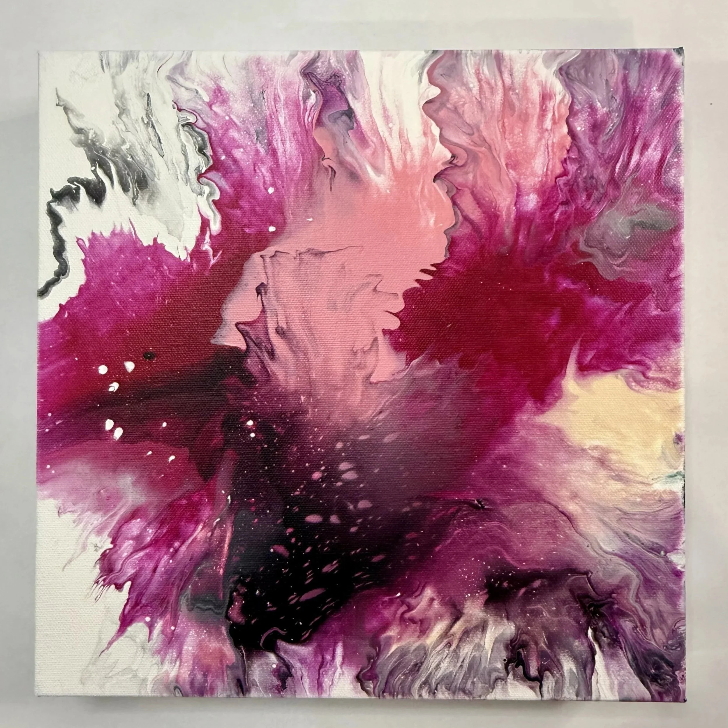 Abstract painting with swirling pink, purple, black, gray, and cream colors.